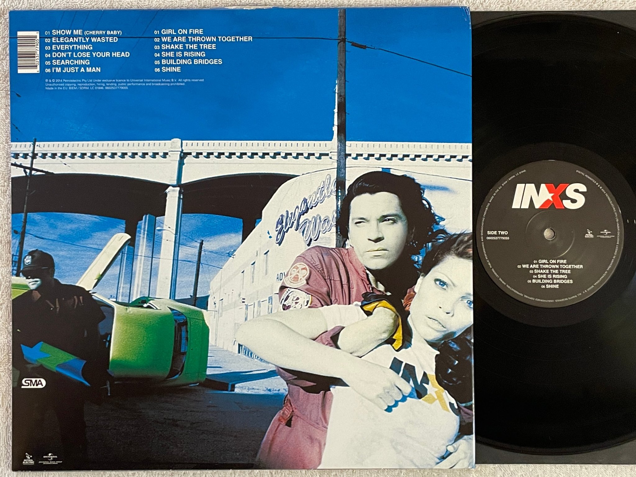 Omslagsbild för skivan INXS elegantly wasted LP 2014 UNIVERSAL 0602537779055 alternative rock