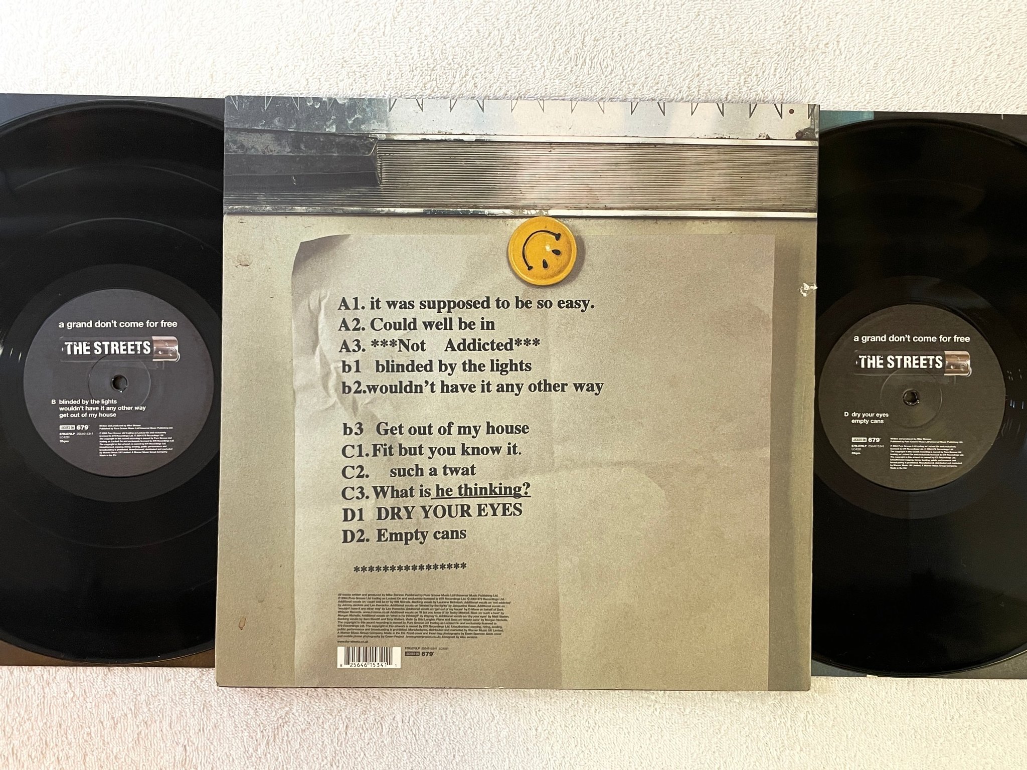 Omslagsbild för skivan THE STREETS A Grand Don't Come For Free 2xLP 2004 679L070LP breaks 