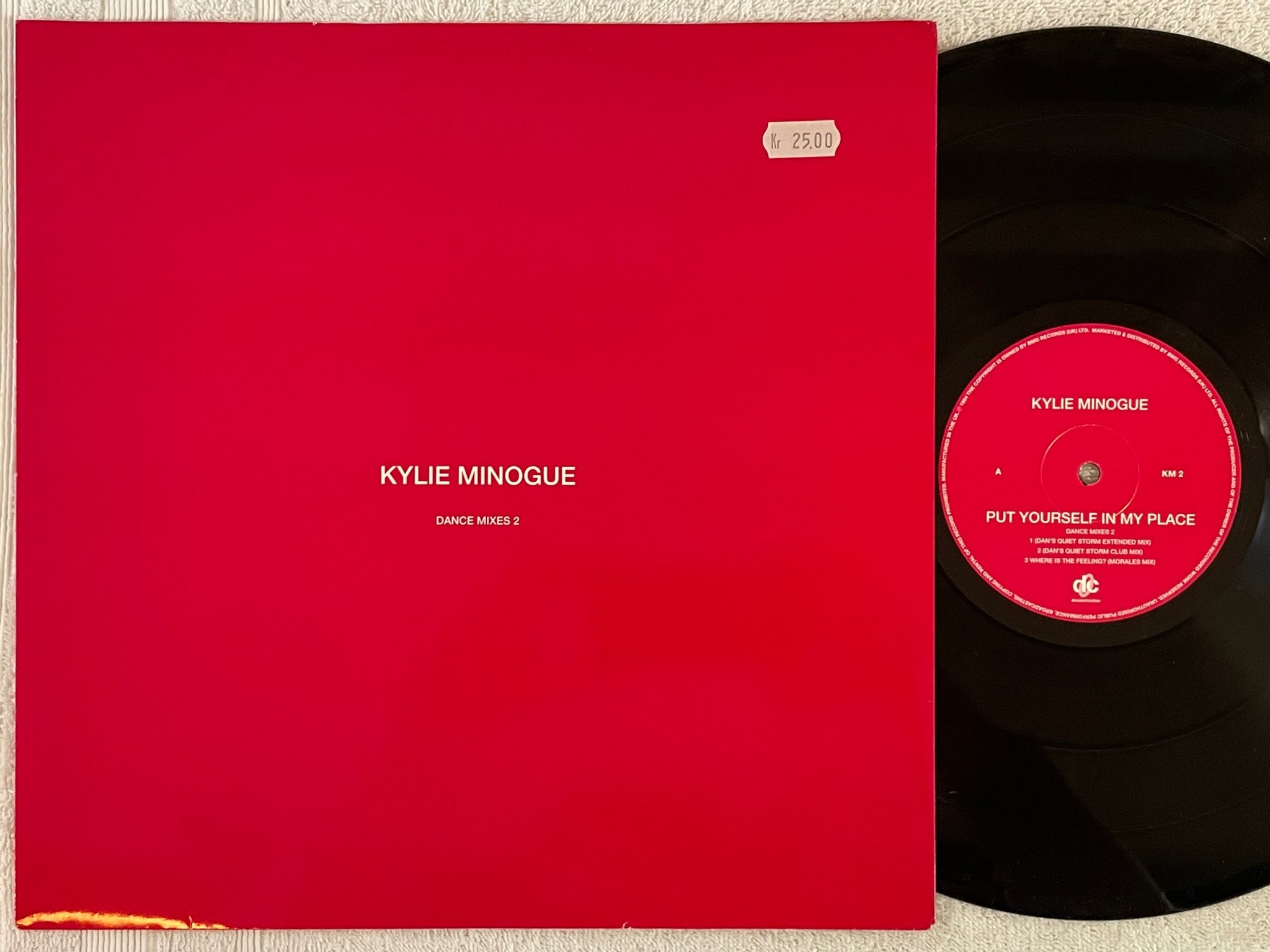 Omslagsbild för skivan KYLIE MINOGUE Put Yourself In My Place (Dance Mixes 2) 12" UK -94 DECONSTRUCTION
