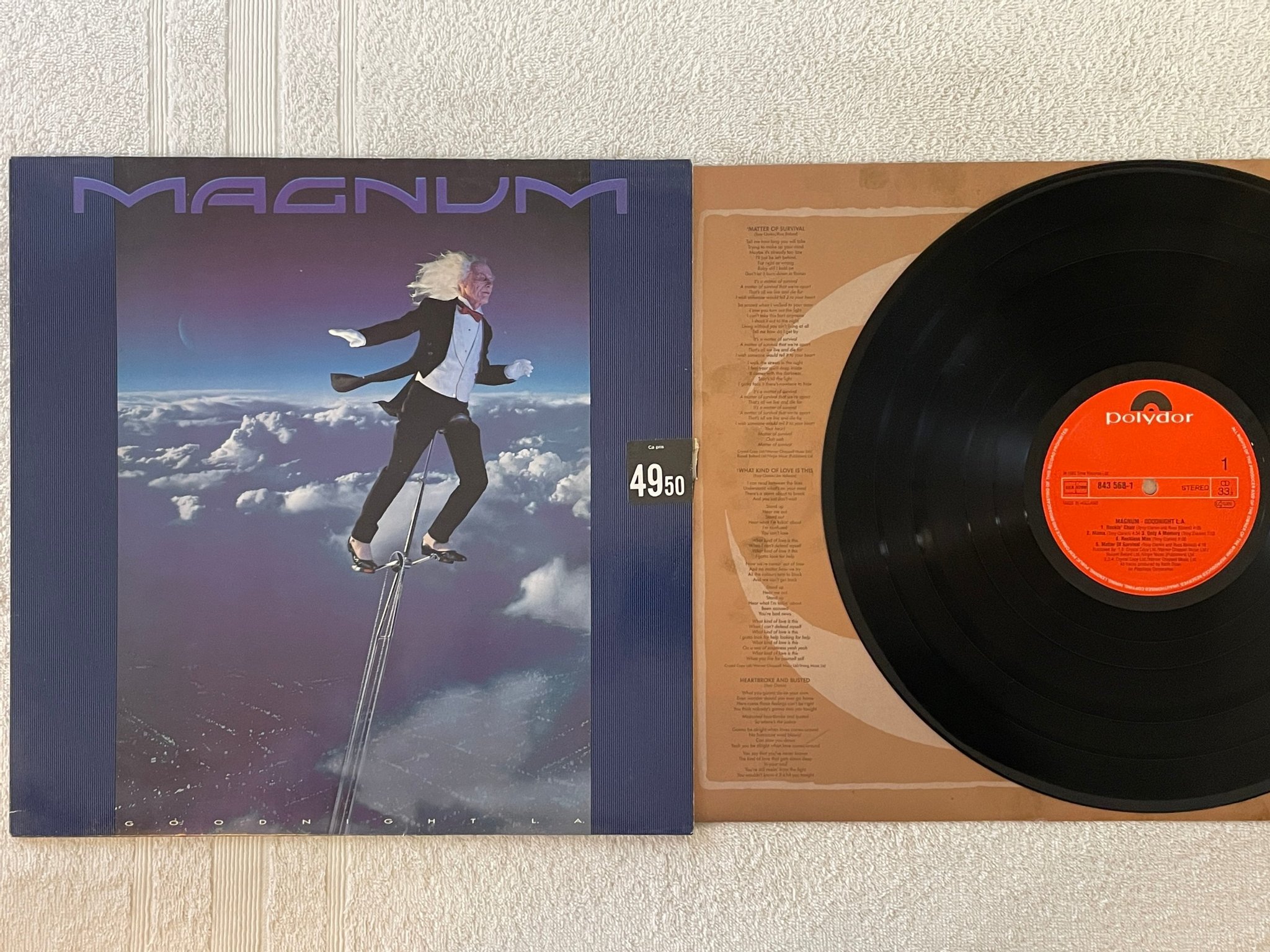 Omslagsbild för skivan MAGNUM goodnight L.A. LP -90 Hol POLYDOR 843568-1
