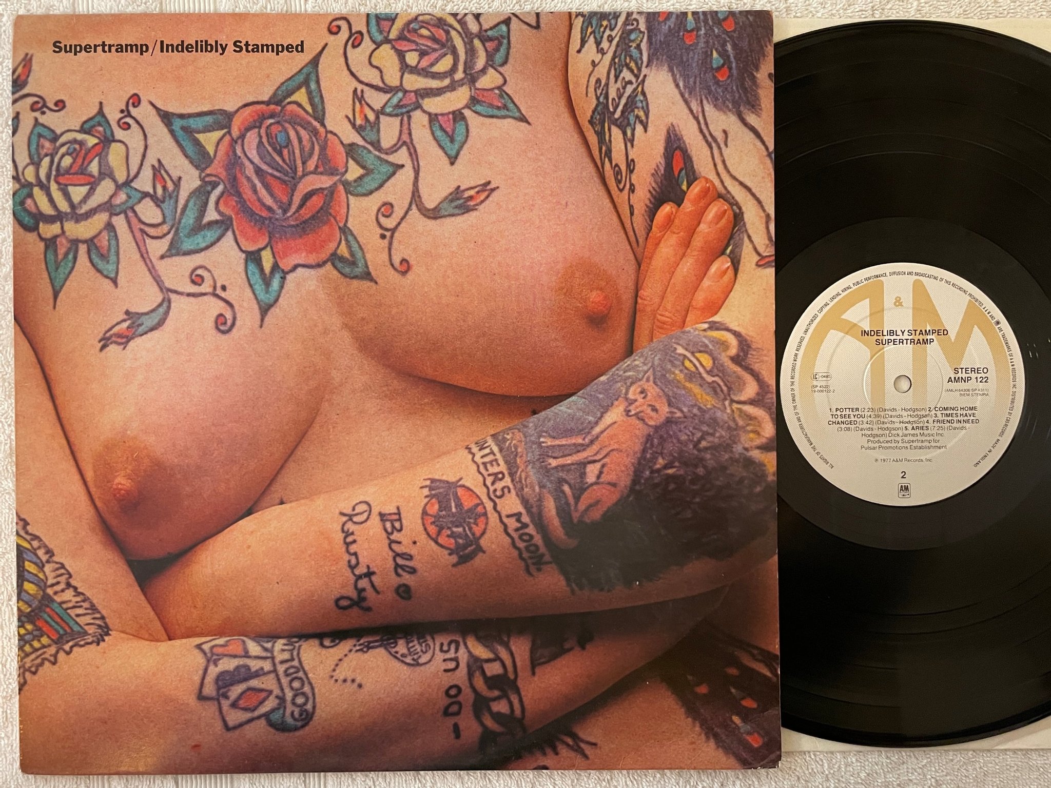 Omslagsbild för skivan SUPERTRAMP indelibly stamped LP -77 UK A&M AMNP-122 