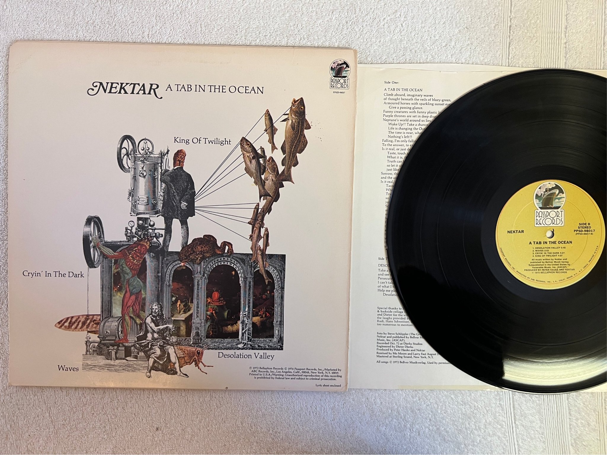 Omslagsbild för skivan NEKTAR A Tab In The Ocean LP -76 US passport ppsd 98017