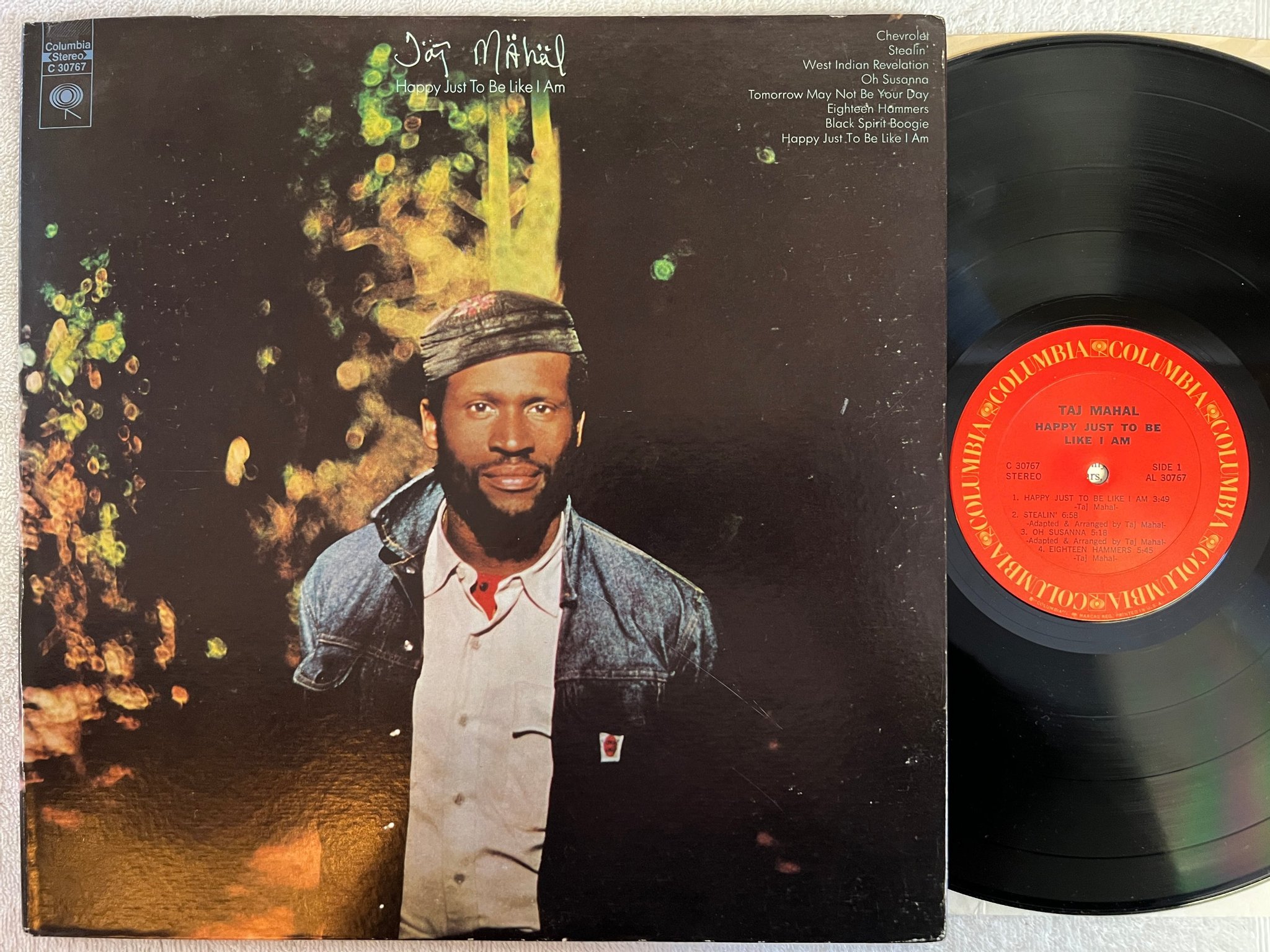 Omslagsbild för skivan TAJ MAHAL happy just to be like I am LP -71 US COLUMBIA C 30767