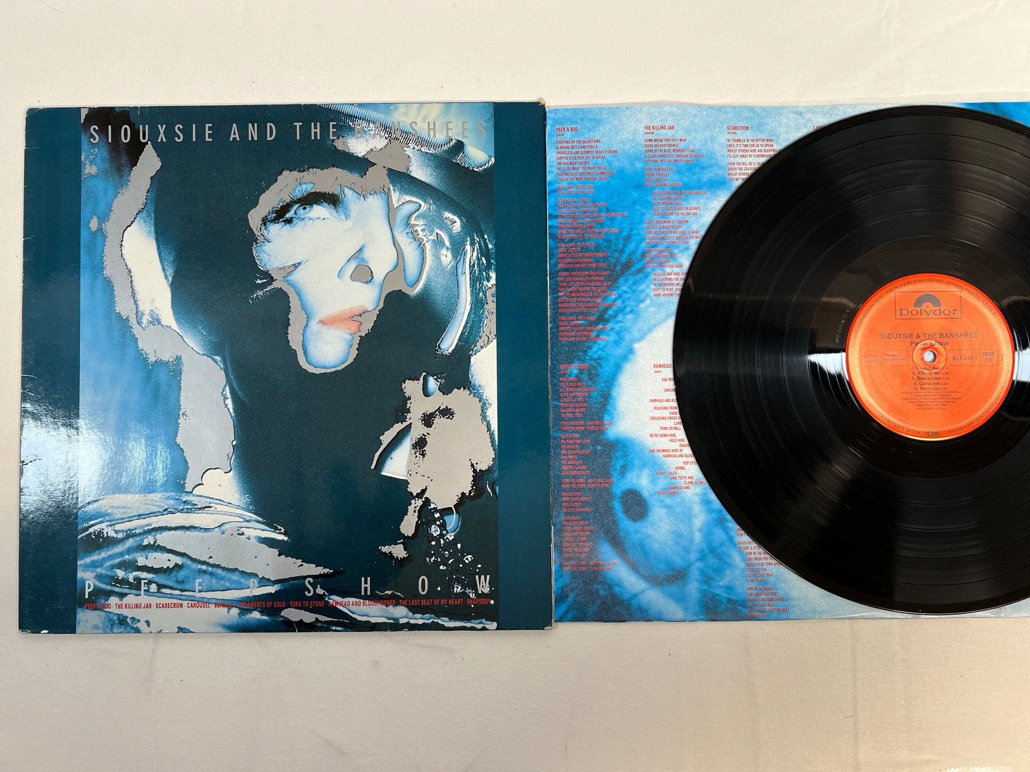Omslagsbild för skivan SIOUXSIE AND THE BANSHEES peep show LP -88 POLYDOR 837240-1