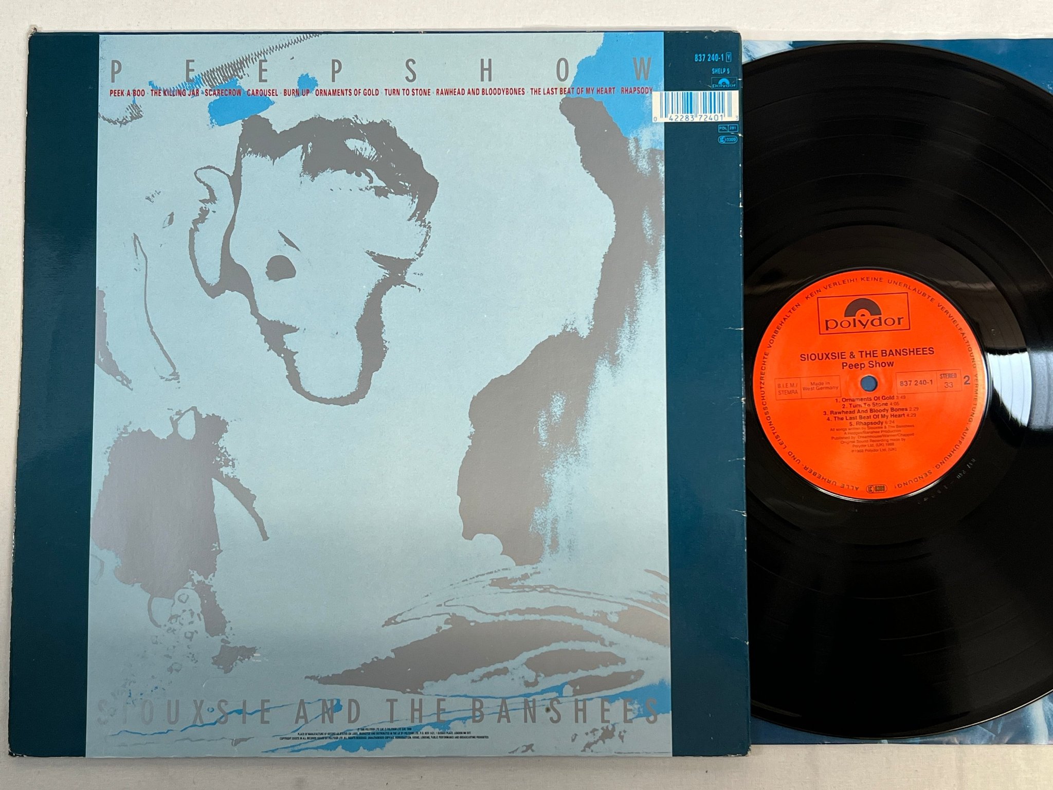 Omslagsbild för skivan SIOUXSIE AND THE BANSHEES peep show LP -88 POLYDOR 837240-1