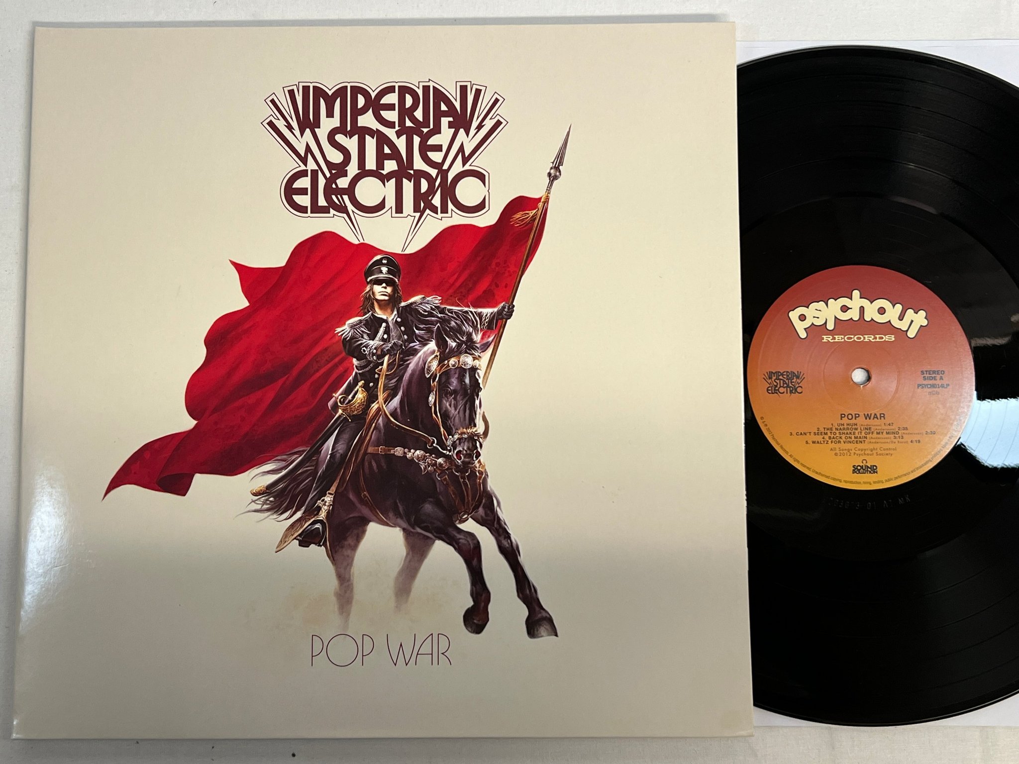 Omslagsbild för skivan IMPERIAL STATE ELECTRIC Pop War LP 2012 Swe PSYCH014LP