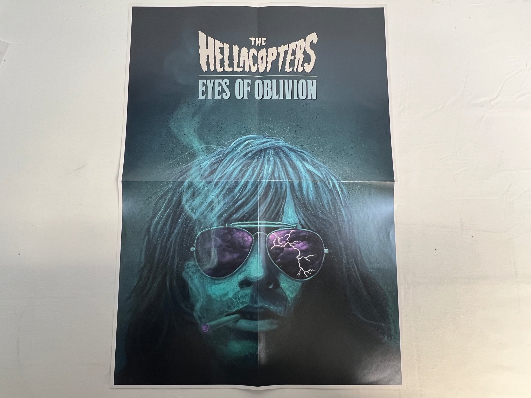 Omslagsbild för skivan THE HELLACOPTERS Eyes Of Oblivion LP 2022 White / Sky Blue Marbled