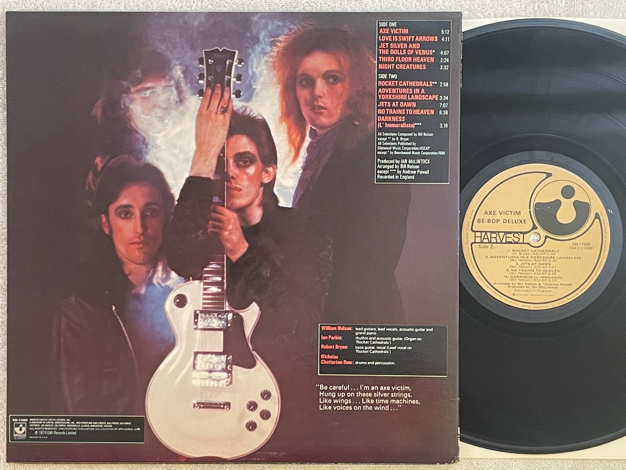 Omslagsbild för skivan BE-BOP DELUXE Axe Victim LP -74/77 US HARVEST SM-11689