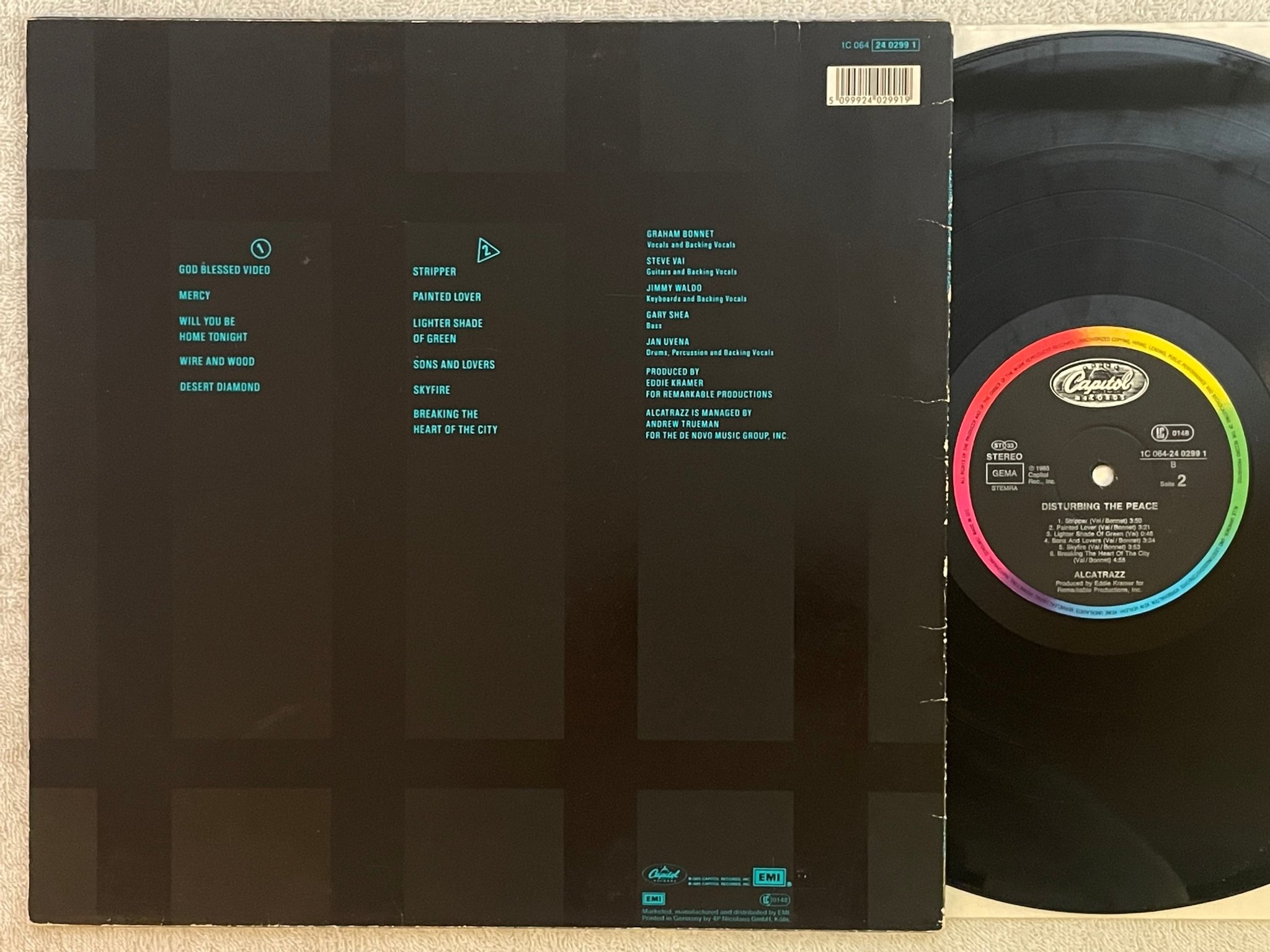 Omslagsbild för skivan ALCATRAZZ Disturbing The Peace LP -85 Ger CAPITOL 1C 064-2402991