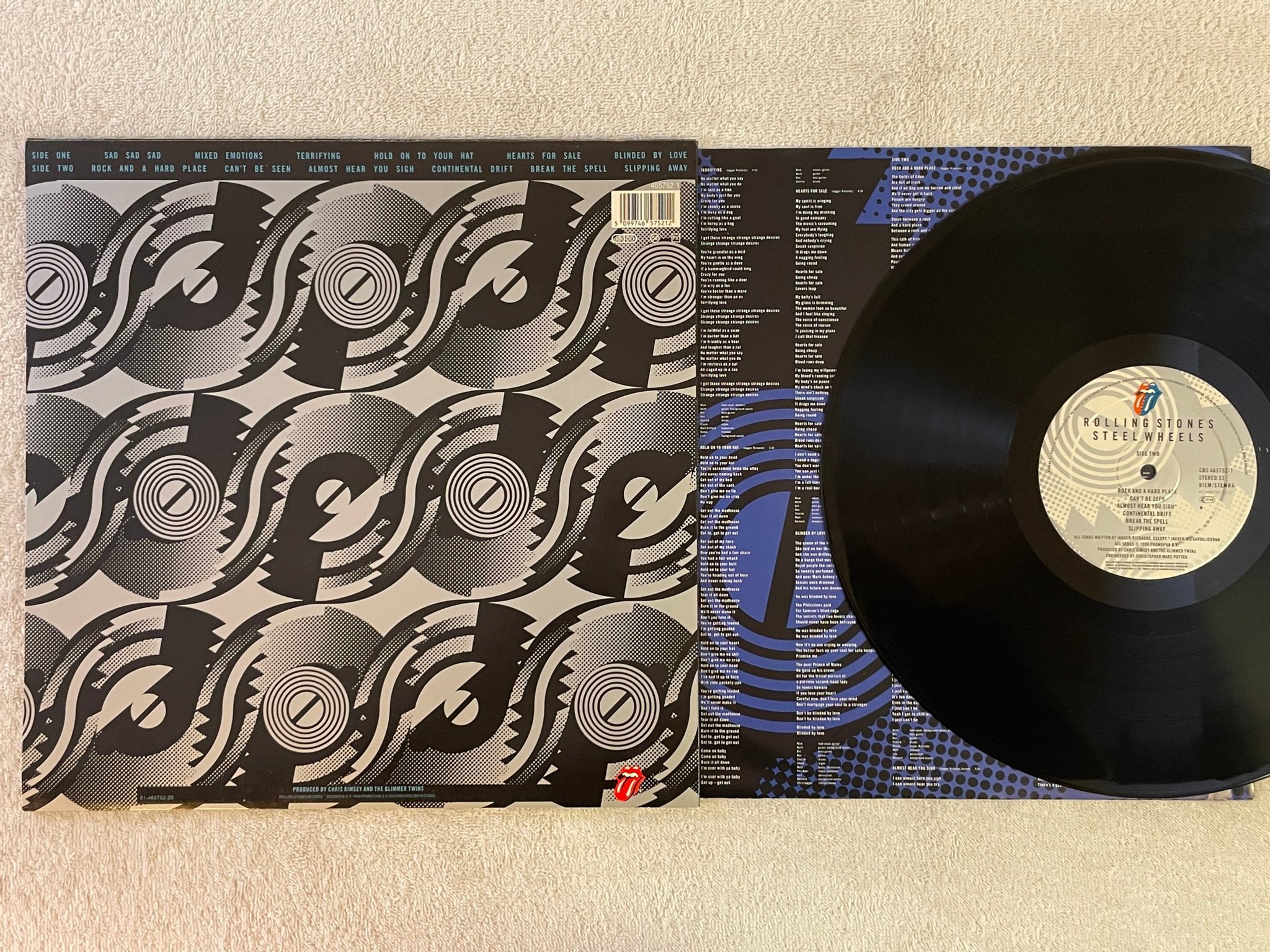 Omslagsbild för skivan ROLLING STONES steel wheels LP -89 Hol CBS 465752-1