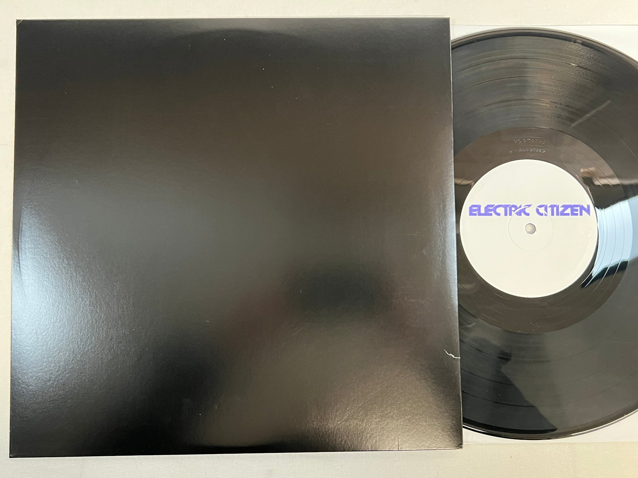 Omslagsbild för skivan ELECTRIC CITIZEN Helltown LP 2016 US TEST PRESS RidingEasy EZRDR094