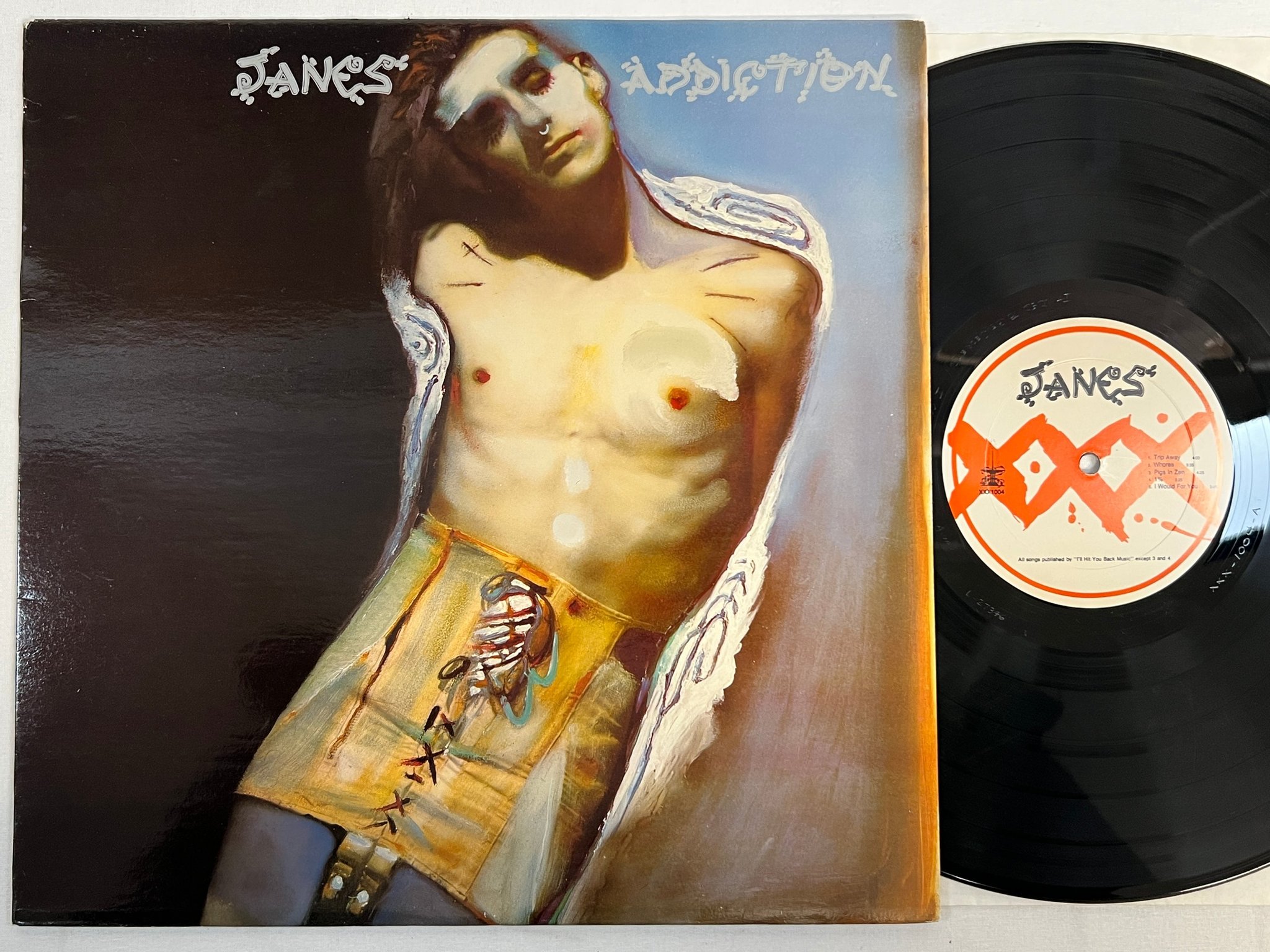 Omslagsbild för skivan JANE'S ADDICTION s/t LP -88 US TRIPLE X 51004-1 ** r a r e **