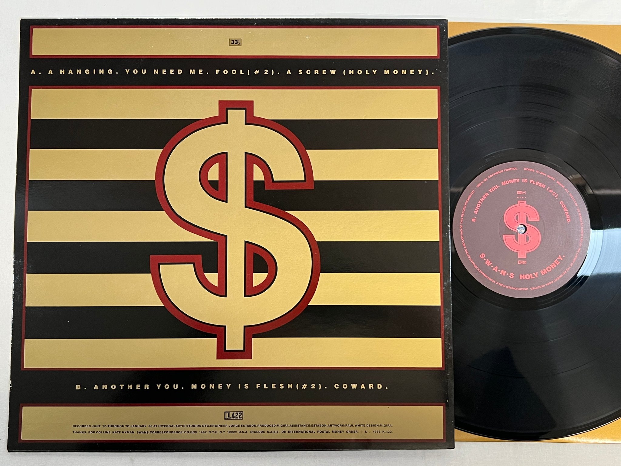 Omslagsbild för skivan SWANS Holy Money LP mini-album -86 UK k.422 KCC 3 INDUSTRIAL ROCK