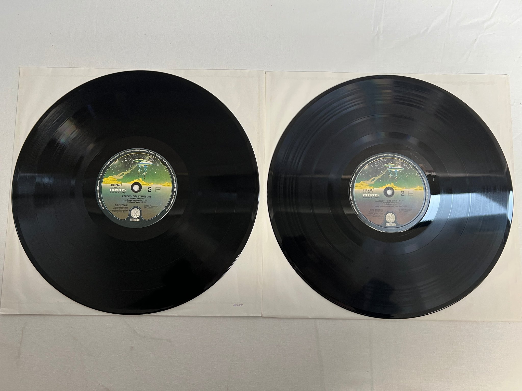 Omslagsbild för skivan DIRE STRAITS alchemy 2xLP -84 Hol VERTIGO 818 244-1