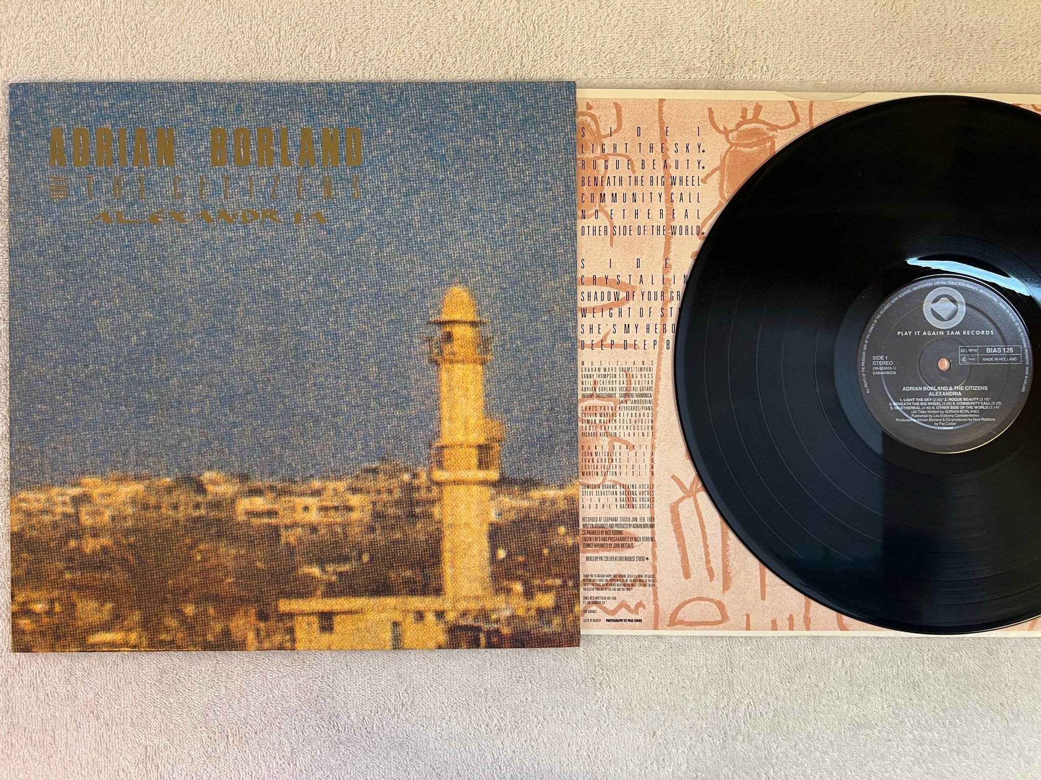 Omslagsbild för skivan ADRIAN BORLAND & THE CITIZENS Alexandria LP -89 Hol BIAS 125 alt rock