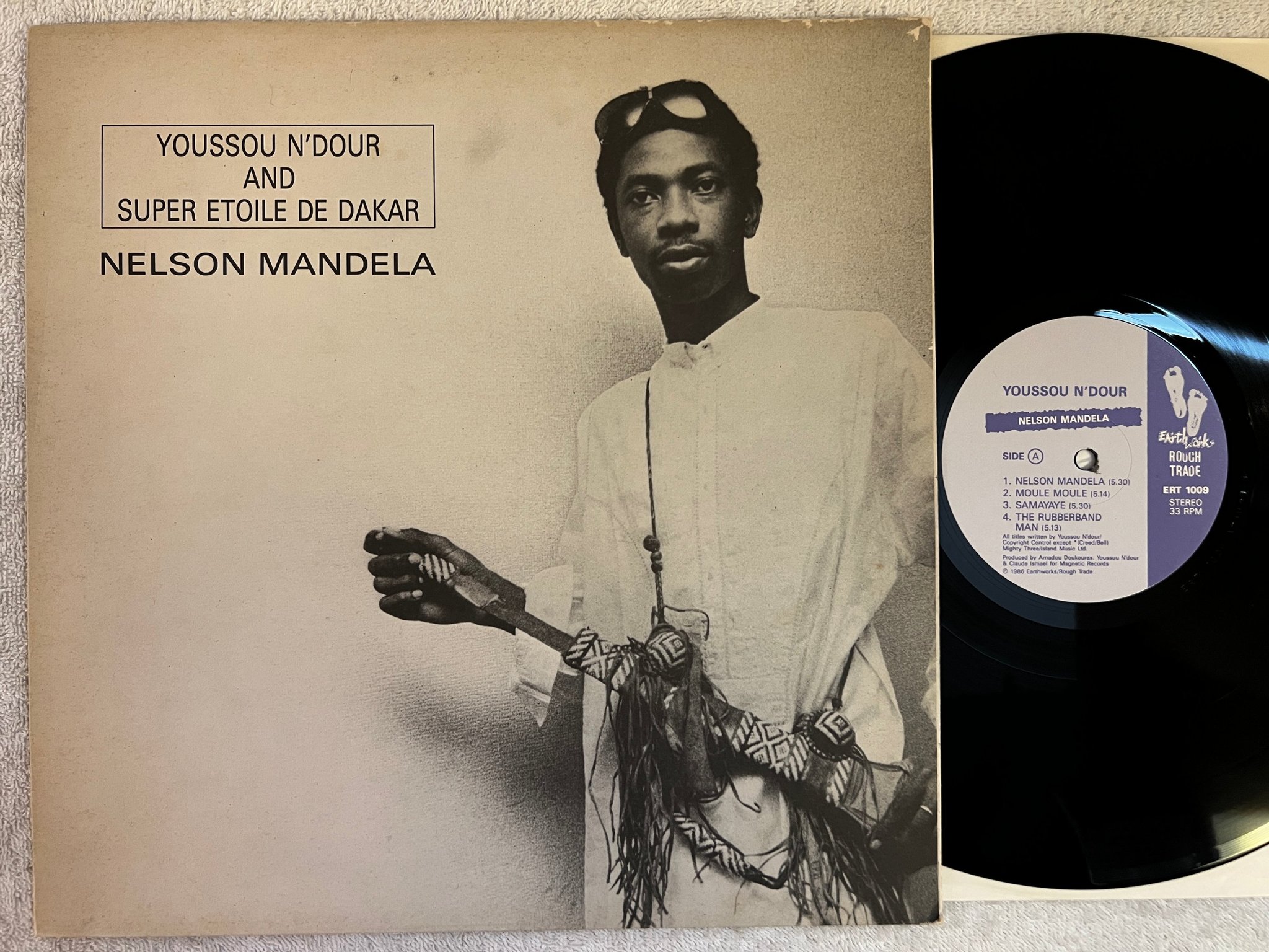 Omslagsbild för skivan YOUSSOU N'DOUR Nelson Mandela LP -86 UK EARTHWORKS ERT 1009