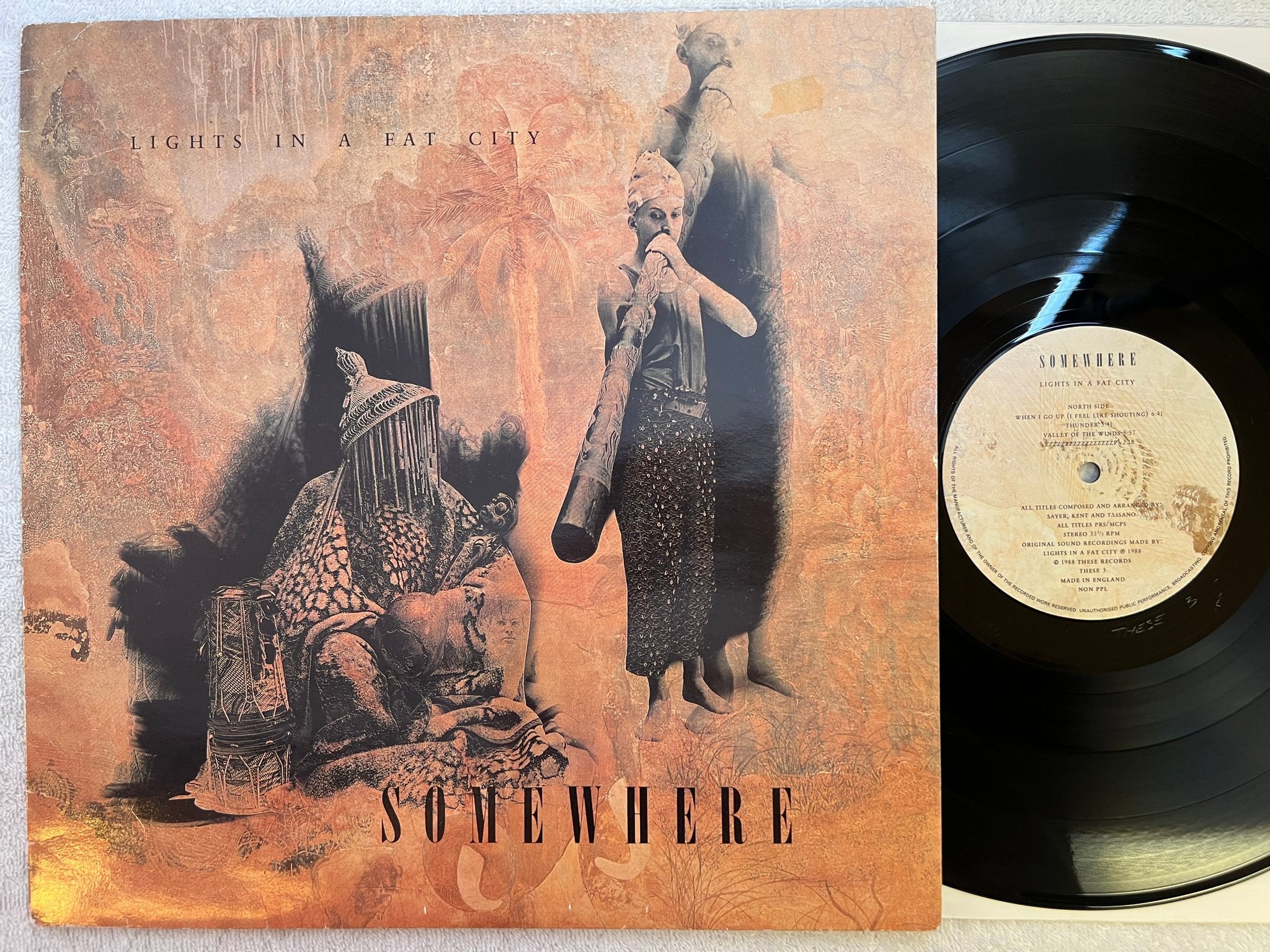 Omslagsbild för skivan Lights In A Fat City - somewhere LP -88 UK THESE 3 tribal / ambient