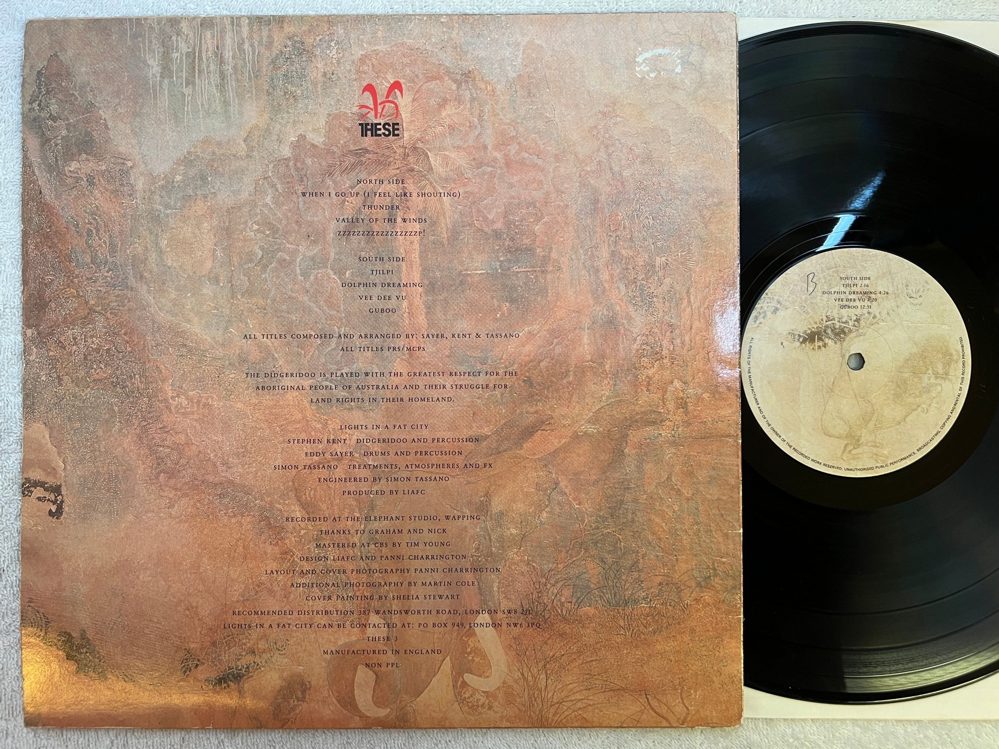 Omslagsbild för skivan Lights In A Fat City - somewhere LP -88 UK THESE 3 tribal / ambient