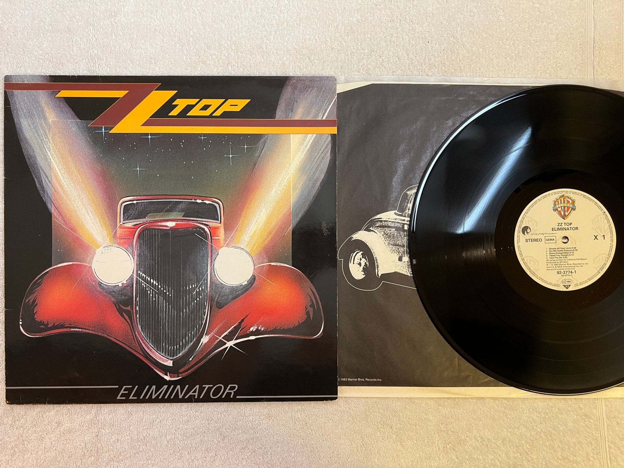 Omslagsbild för skivan ZZ TOP eliminator LP -83 Ger WARNER BROS 92-3774-1