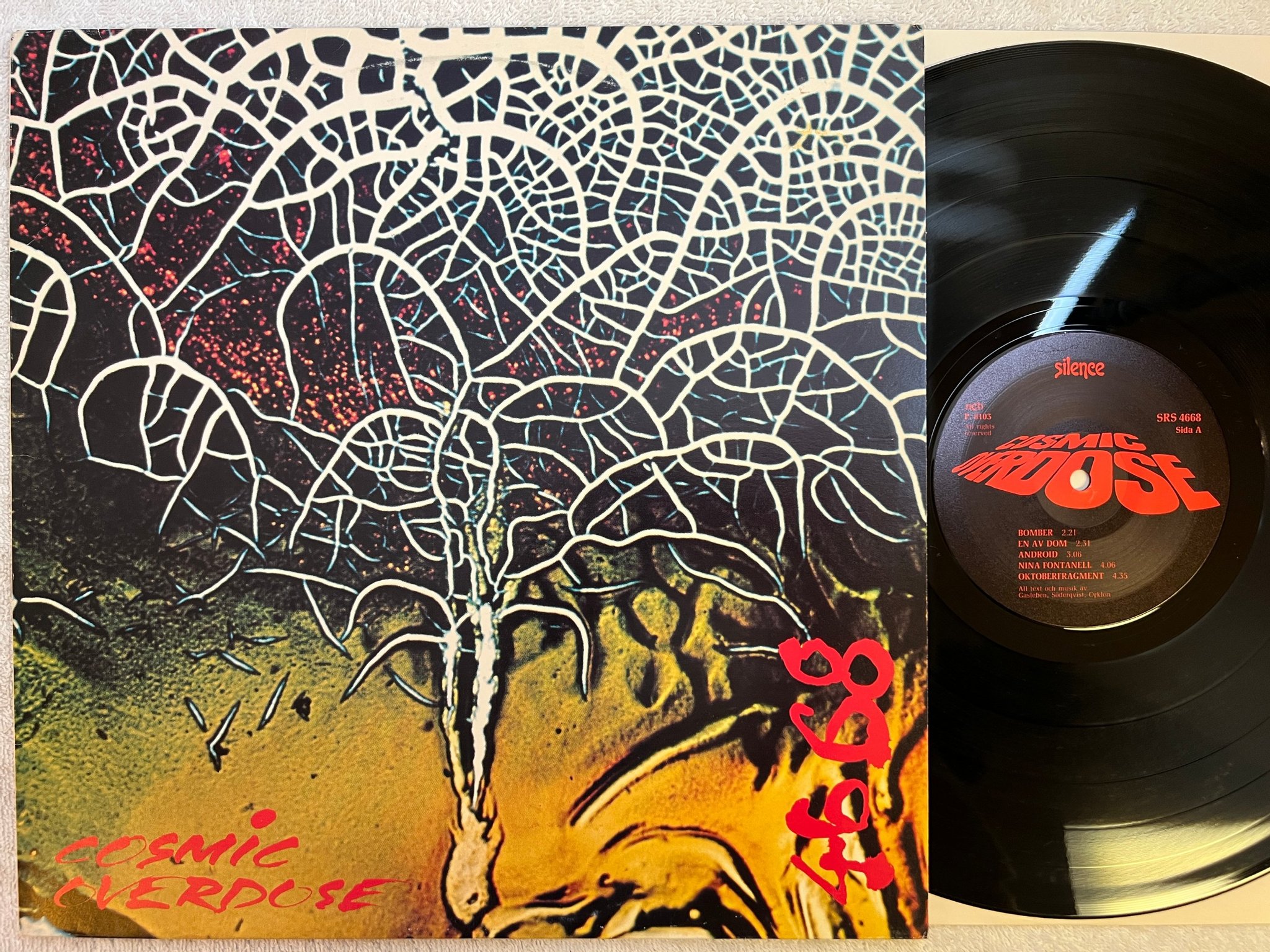 Omslagsbild för skivan COSMIC OVERDOSE 4668 LP -81 Swe SILENCE SRS 4668
