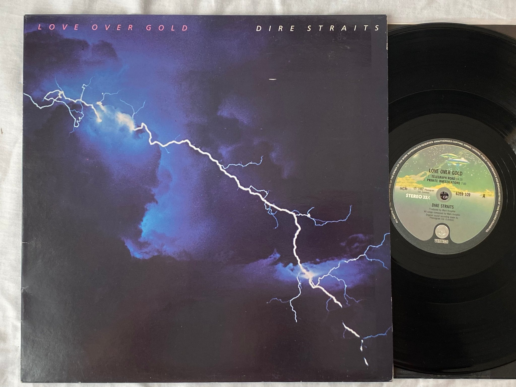 Omslagsbild för skivan DIRE STRAITS love over gold LP -82 ncb VERTIGO 6359 109