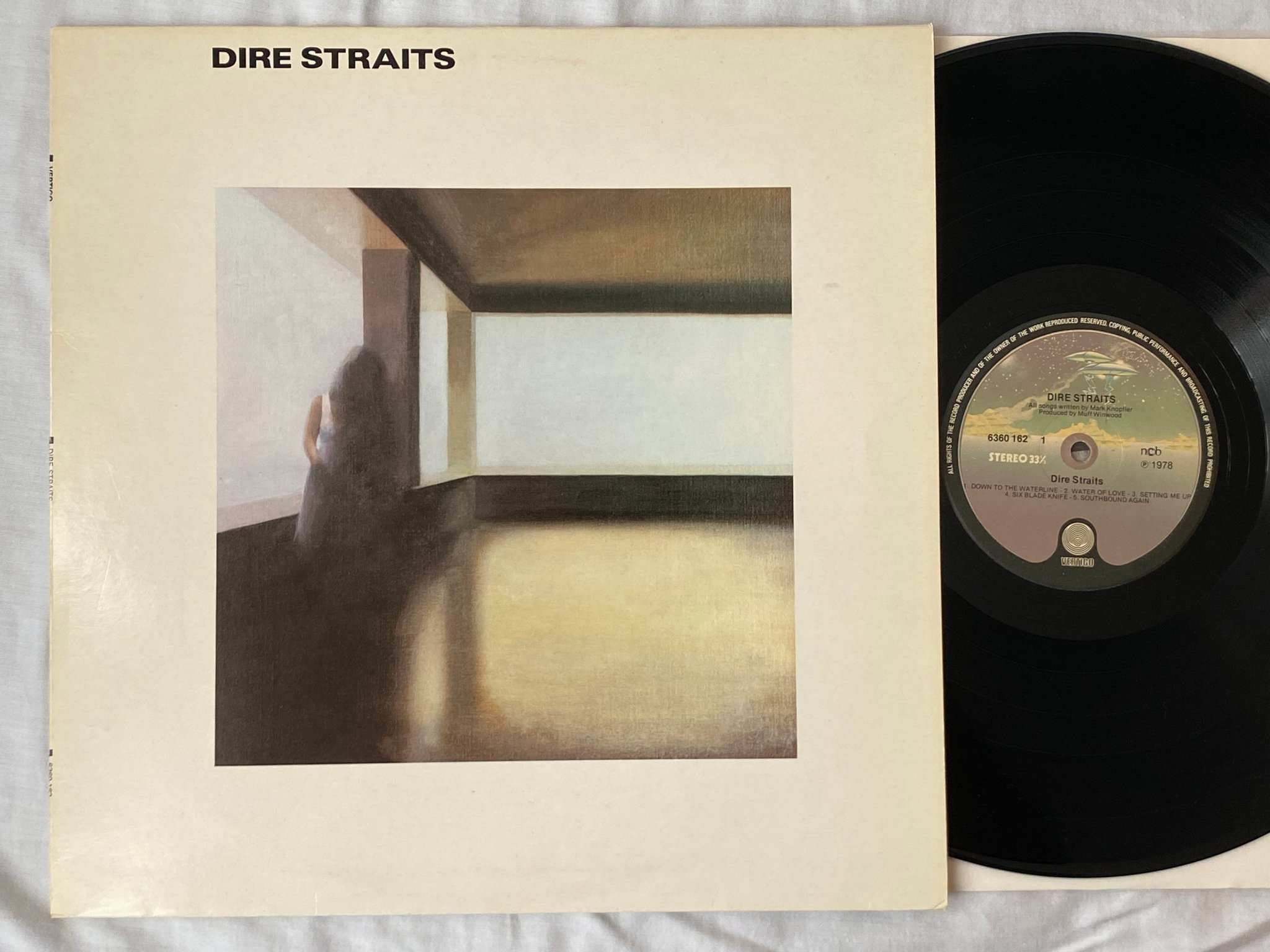 Omslagsbild för skivan DIRE STRAITS s/t LP -78 ncb VERTIGO 6360 162