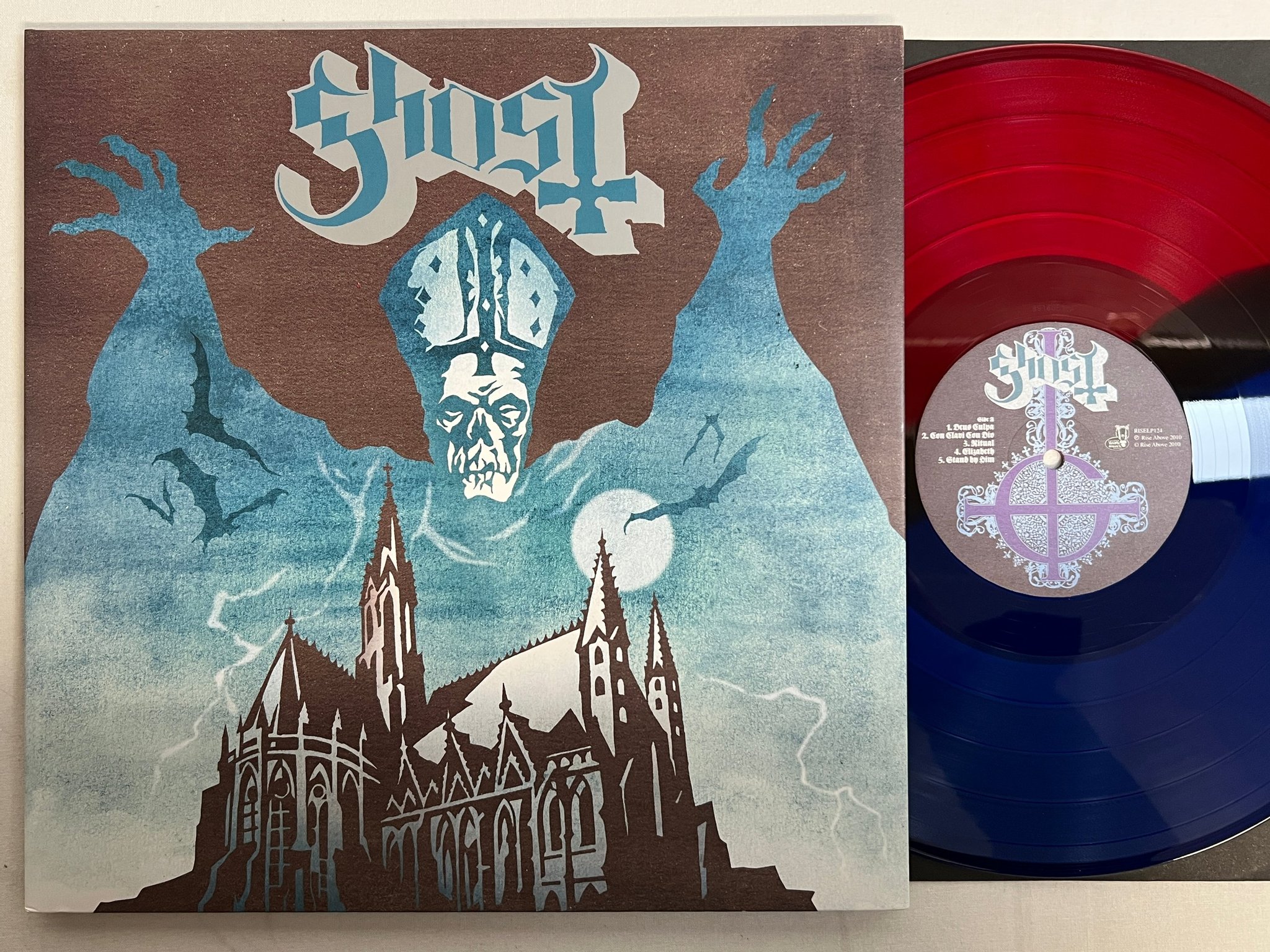 Omslagsbild för skivan GHOST Opvs Eponymovs LP 2011 RISE ABOVE RISELP124 Red/Blue Split