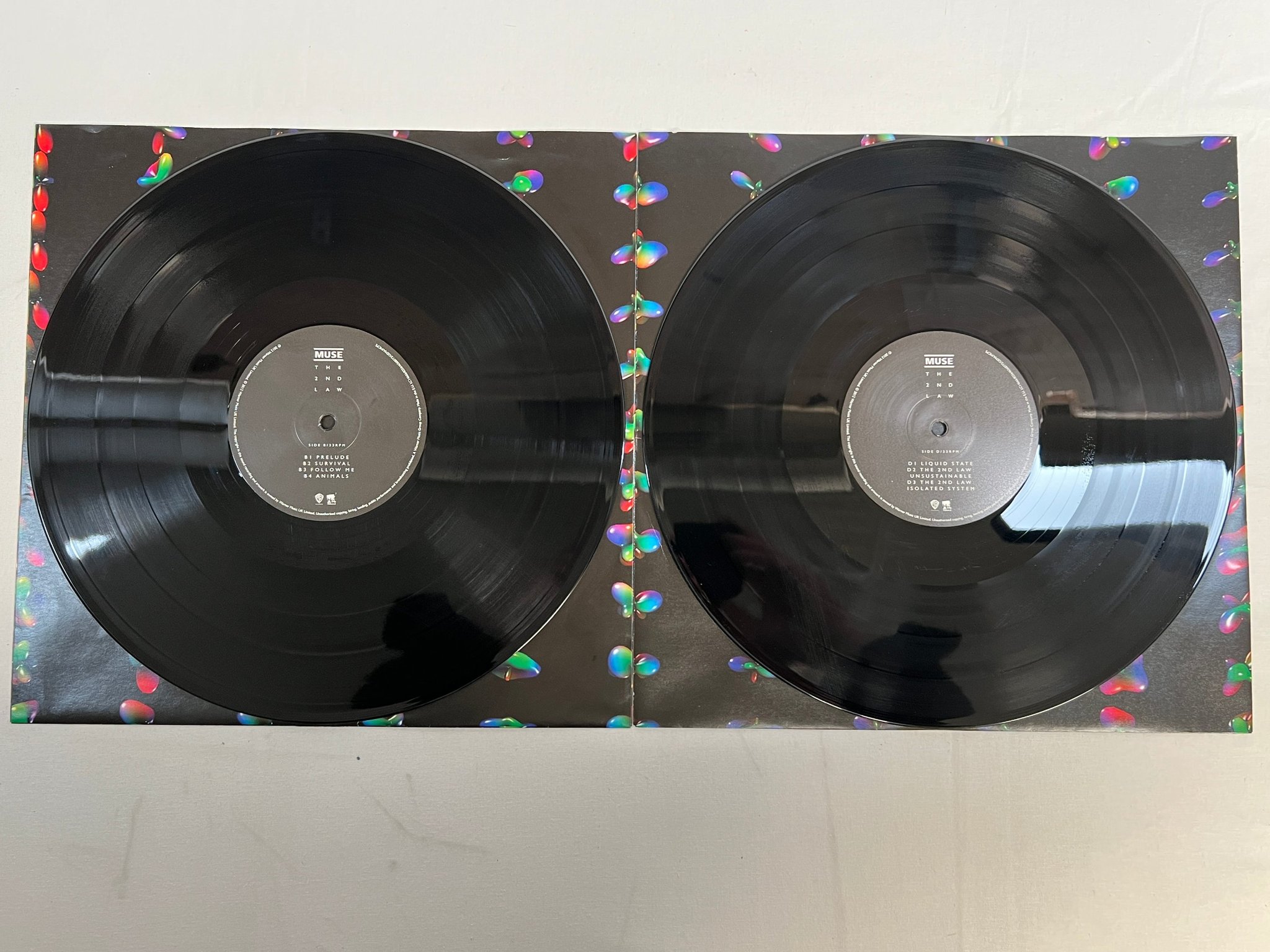 Omslagsbild för skivan MUSE The 2nd Law 2xLP 2012 UK WARNER BROS 825646568772