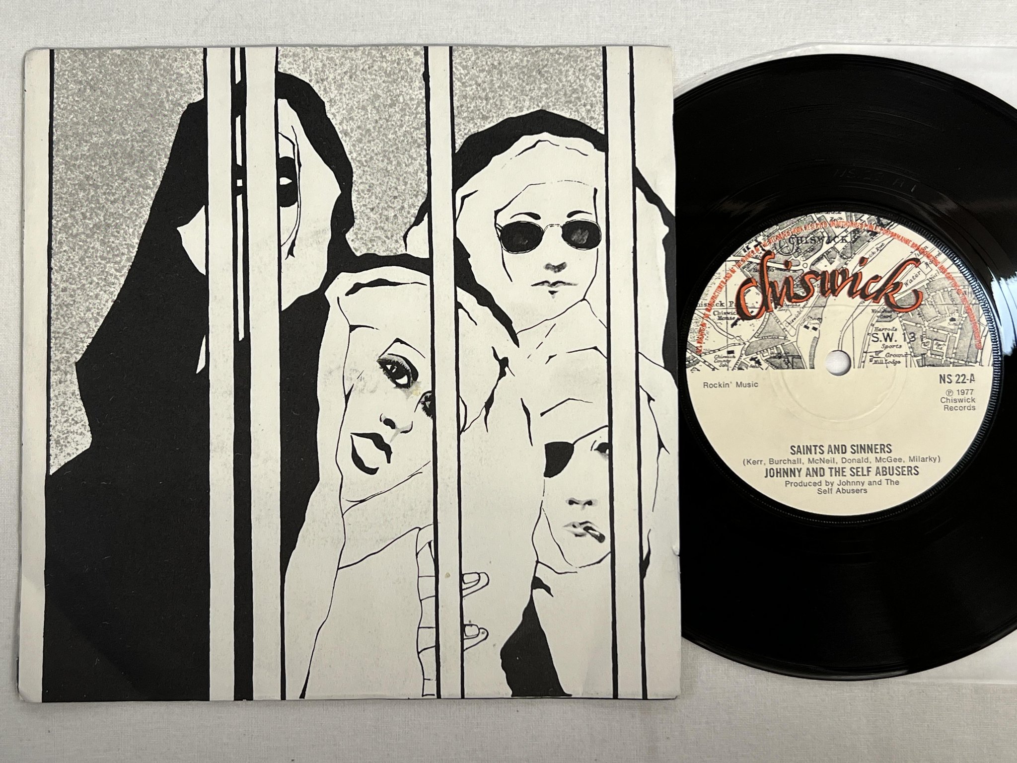 Omslagsbild för skivan JOHNNY AND THE SELF ABUSERS saints and sinners  7" -77 CHISWICK NS-22