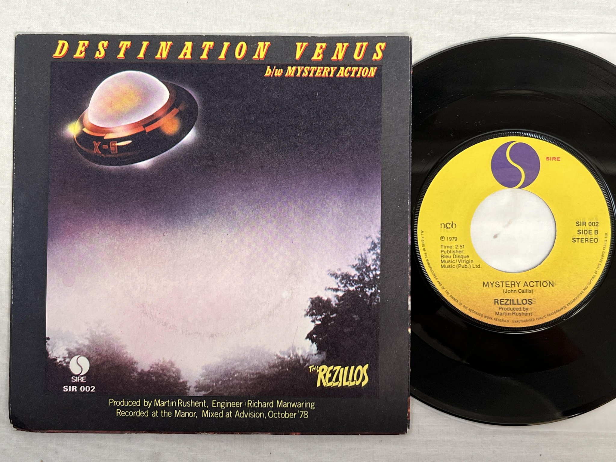 Omslagsbild för skivan THE REZILLOS destination venus 7" -79 ncb SIRE SIR-002 punk