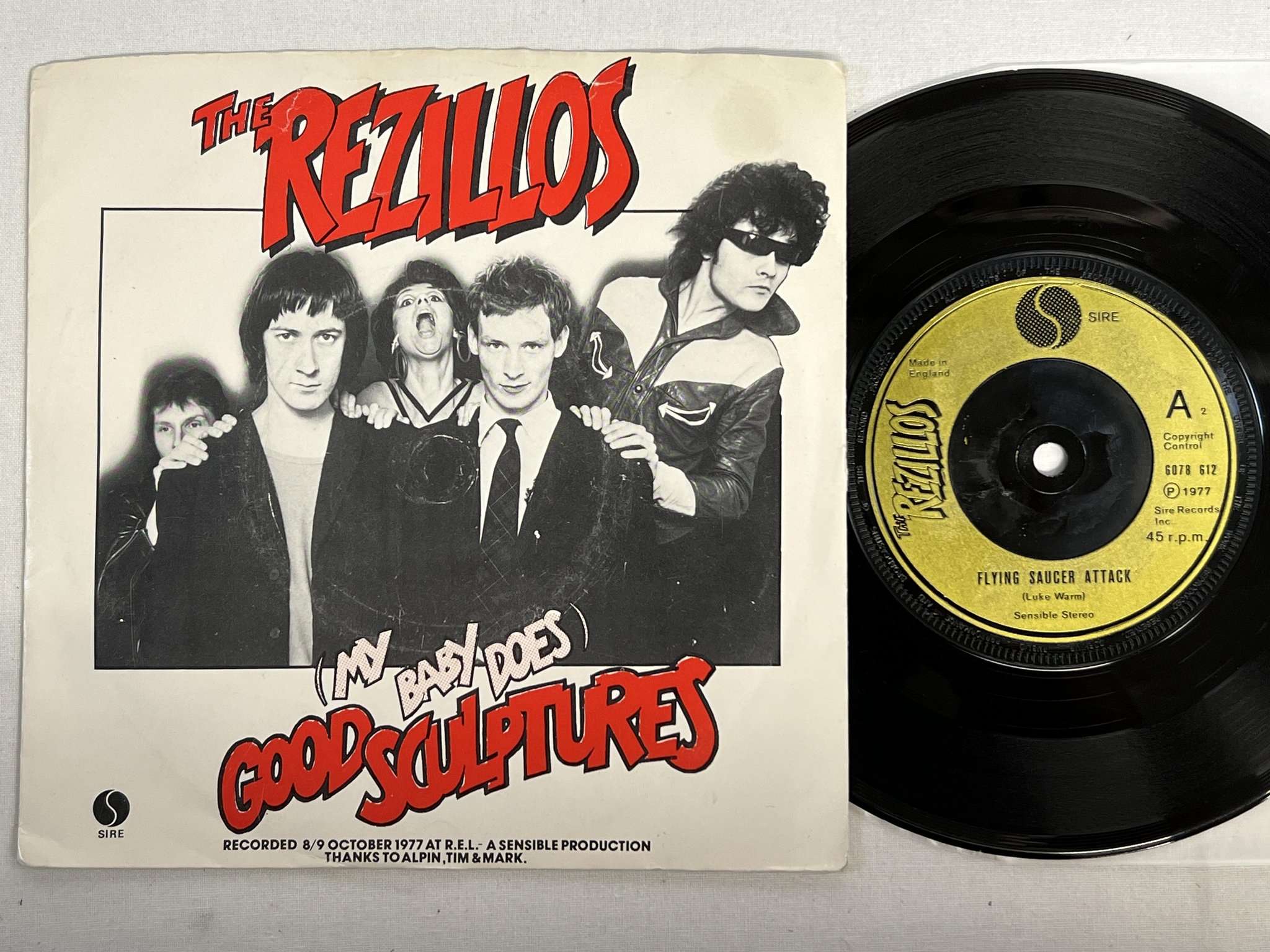 Omslagsbild för skivan THE REZILLOS good sculptures  7" -77 UK SIRE 6078 612 punk rock