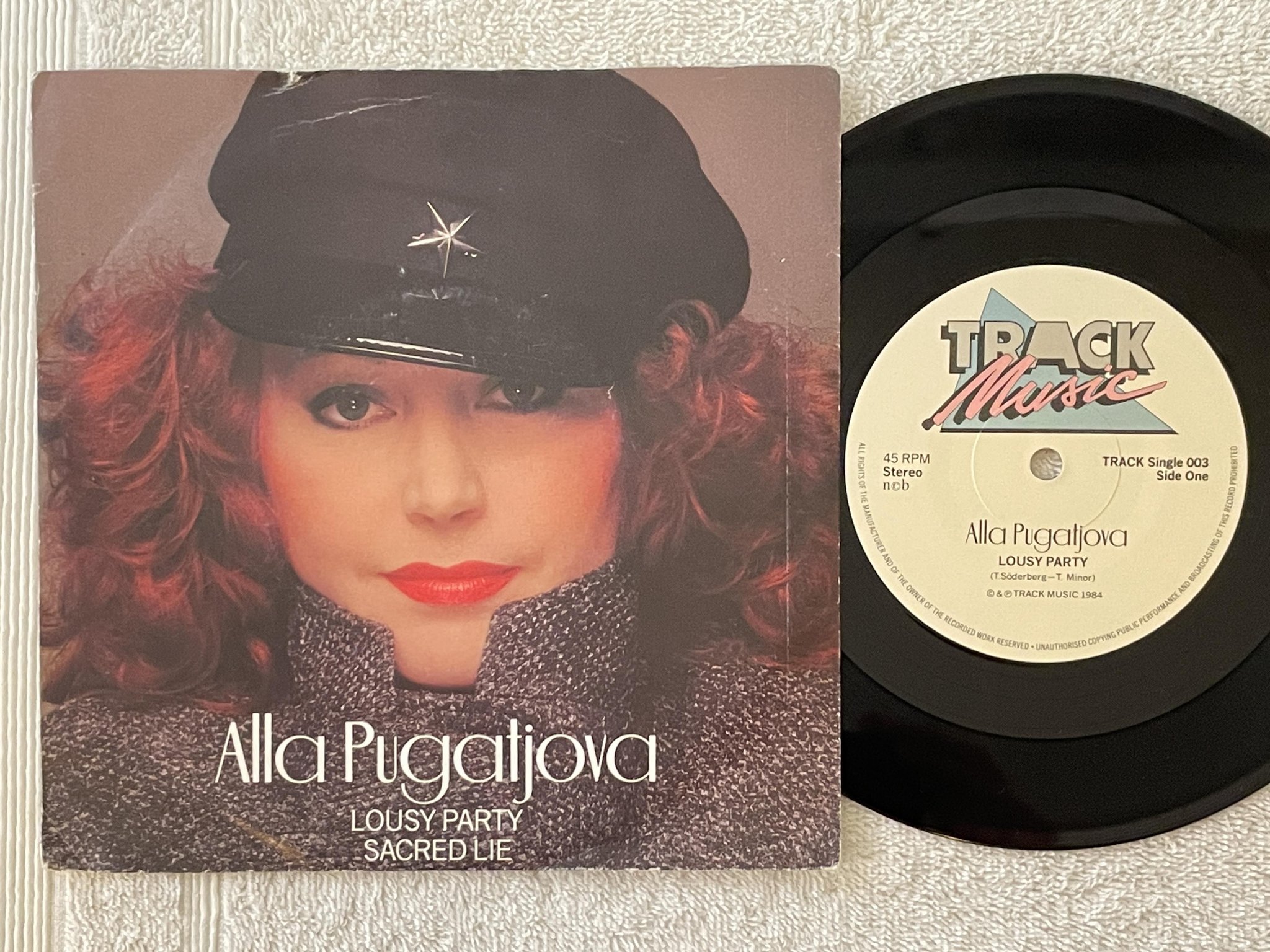 Omslagsbild för skivan ALLA PUGATJOVA lousy party 7" -84 Swe TRACK Single 003