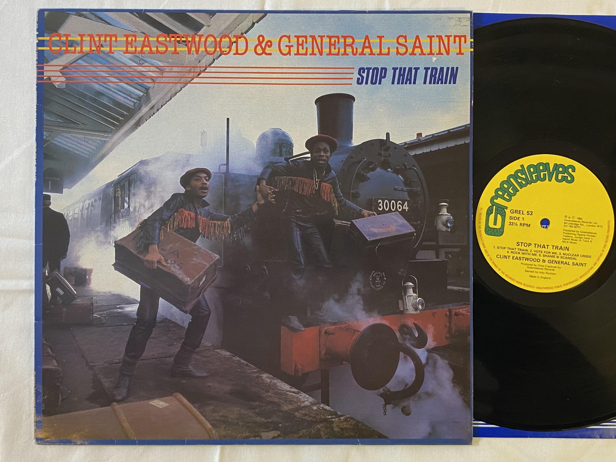 Omslagsbild för skivan CLINT EASTWOOD & GENERAL SAINT stop that t  LP -83 GREENSLEEVES GREL 53