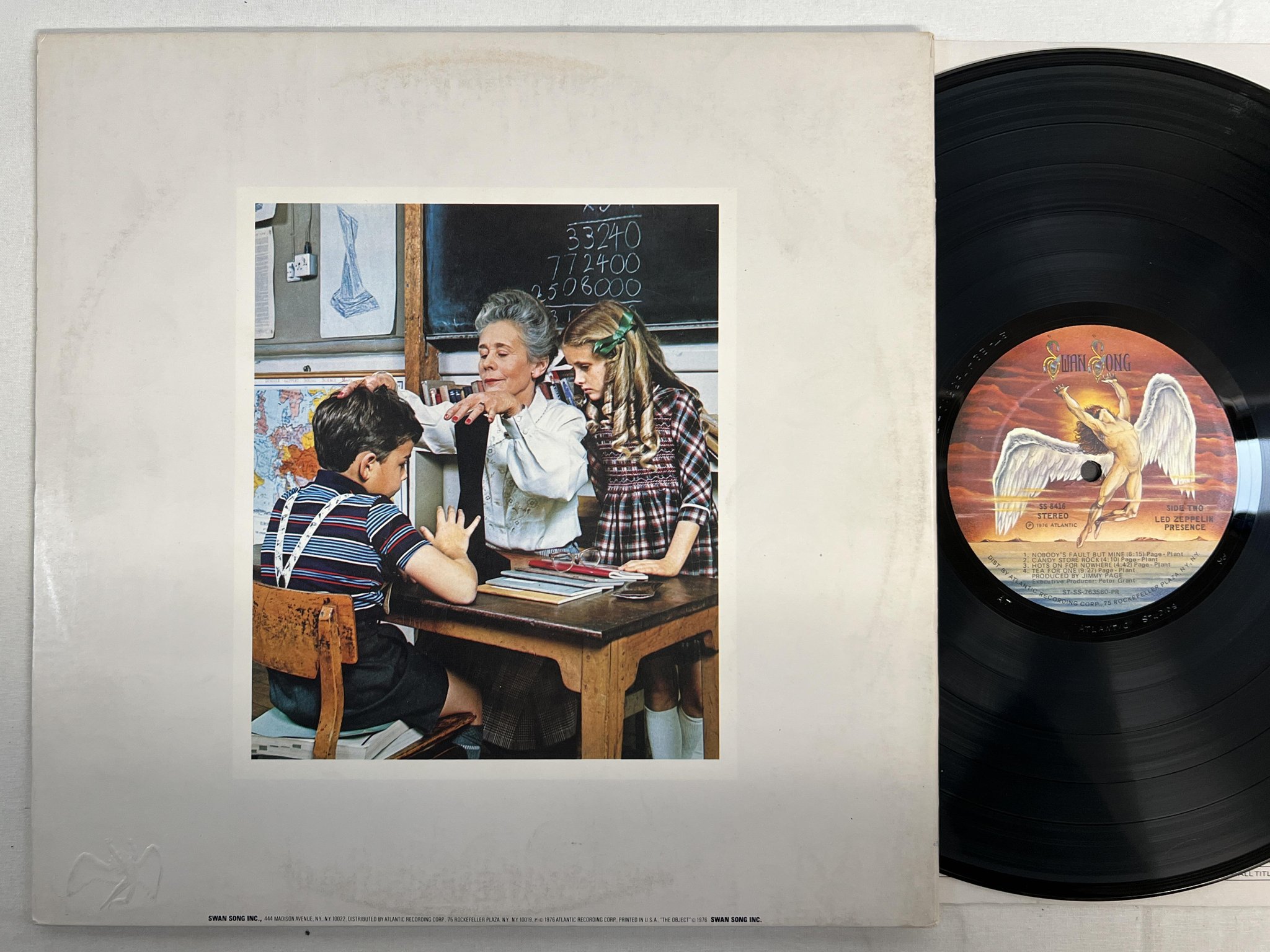 Omslagsbild för skivan LED ZEPPELIN presence LP -76 US SWAN SONG SS 8416