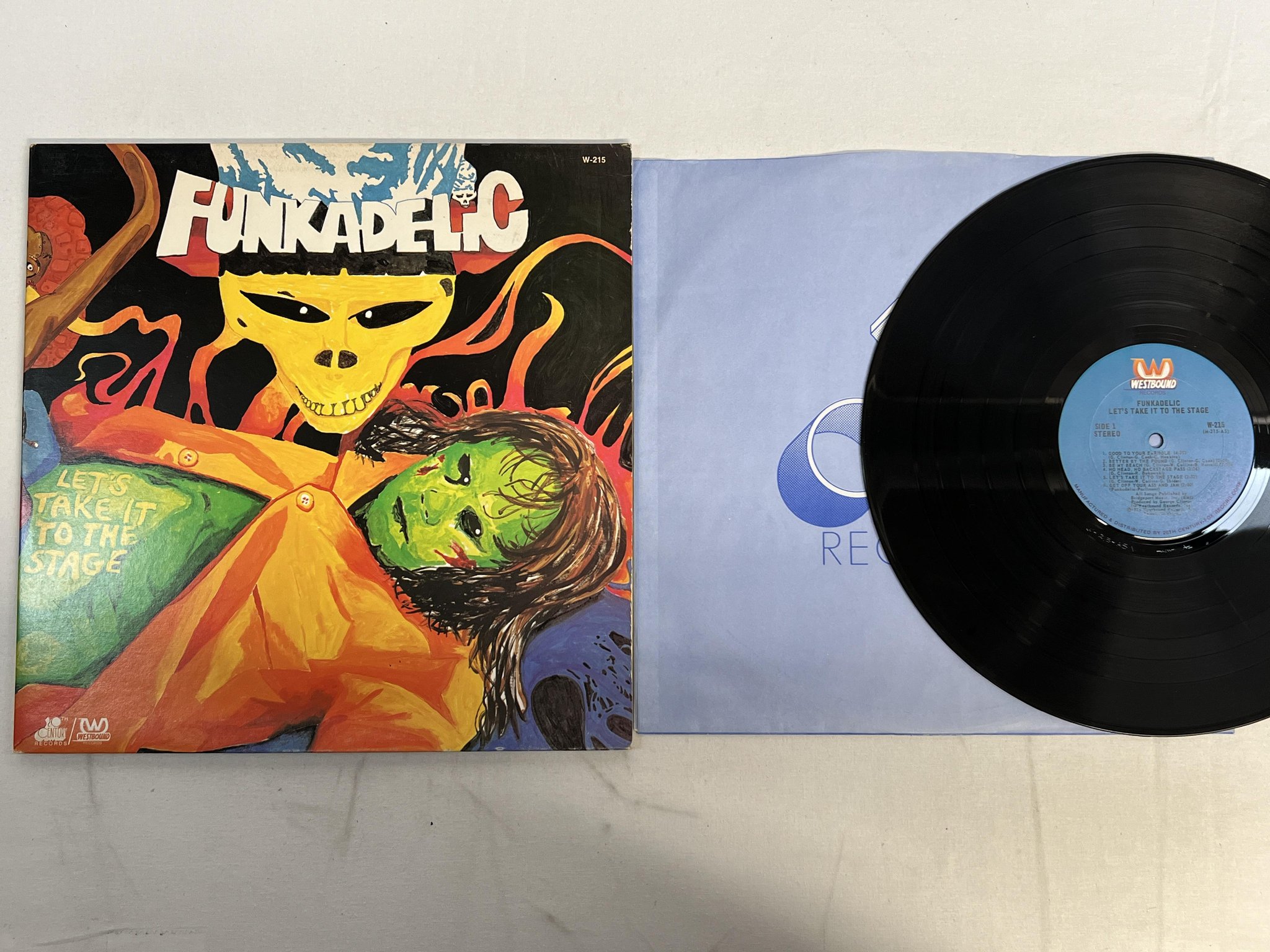 Omslagsbild för skivan FUNKADELIC let's take it to the stage LP -75 US WESTBOUND W-215 funk