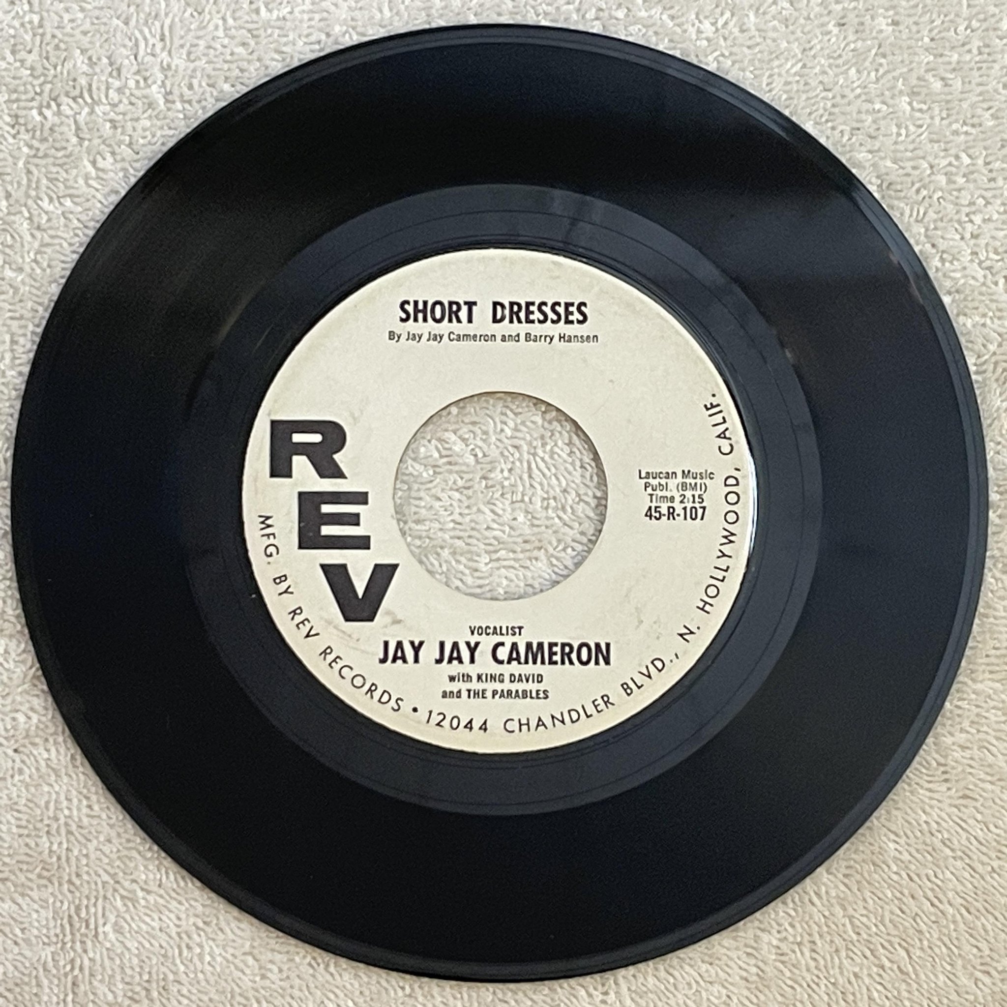 Omslagsbild för skivan JAY JAY CAMERON short dresses 7"single US REV 45-R-107