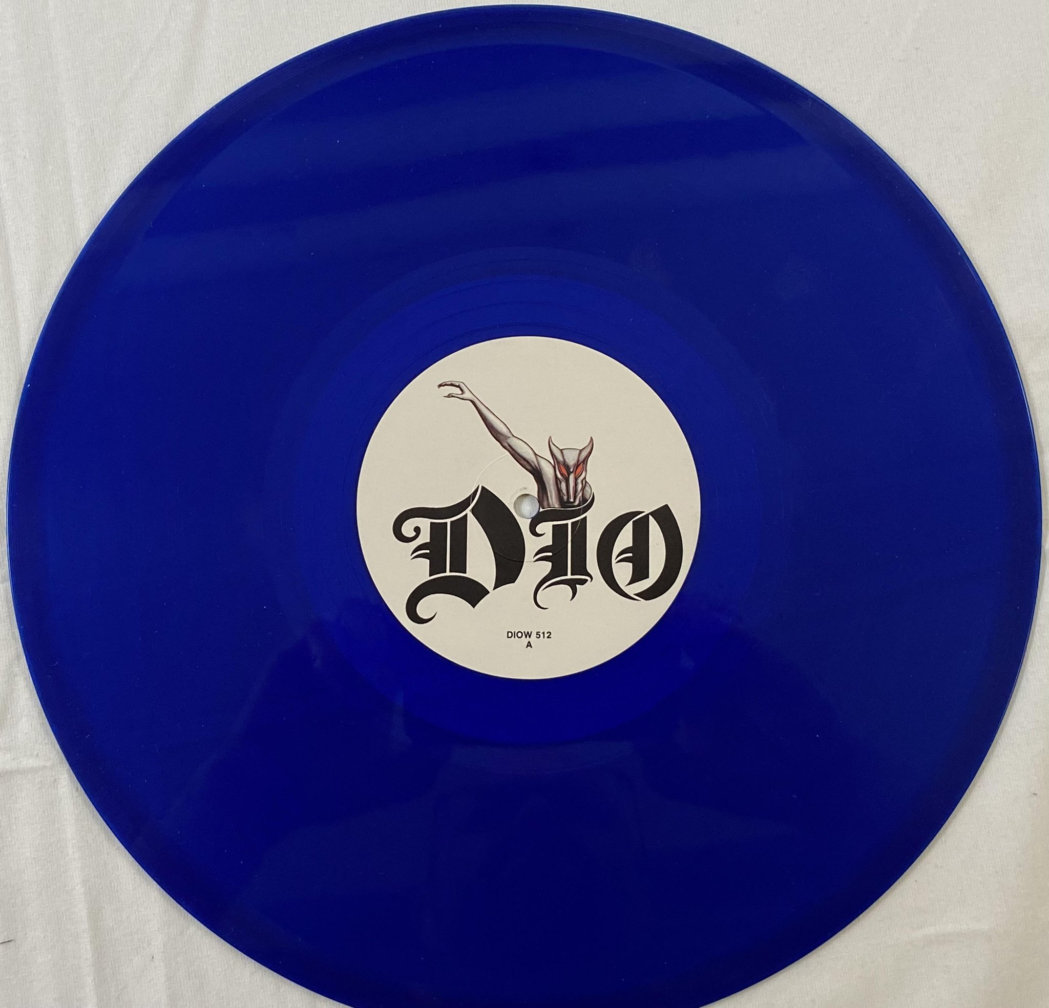 Omslagsbild för skivan DIO Rock 'N' Roll Children 12"single -85 UK VERTIGO DIOW 512 BLUE VINYL