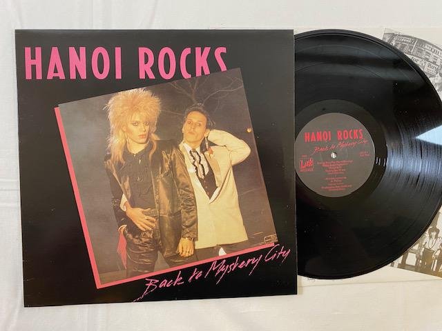 Omslagsbild för skivan HANOI ROCKS Back To Mystery City LP -83 UK lick LICLP1