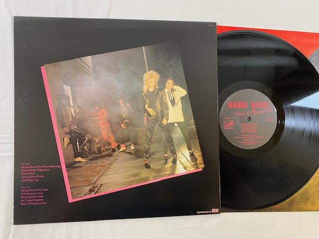 Omslagsbild för skivan HANOI ROCKS Back To Mystery City LP -83 UK lick LICLP1