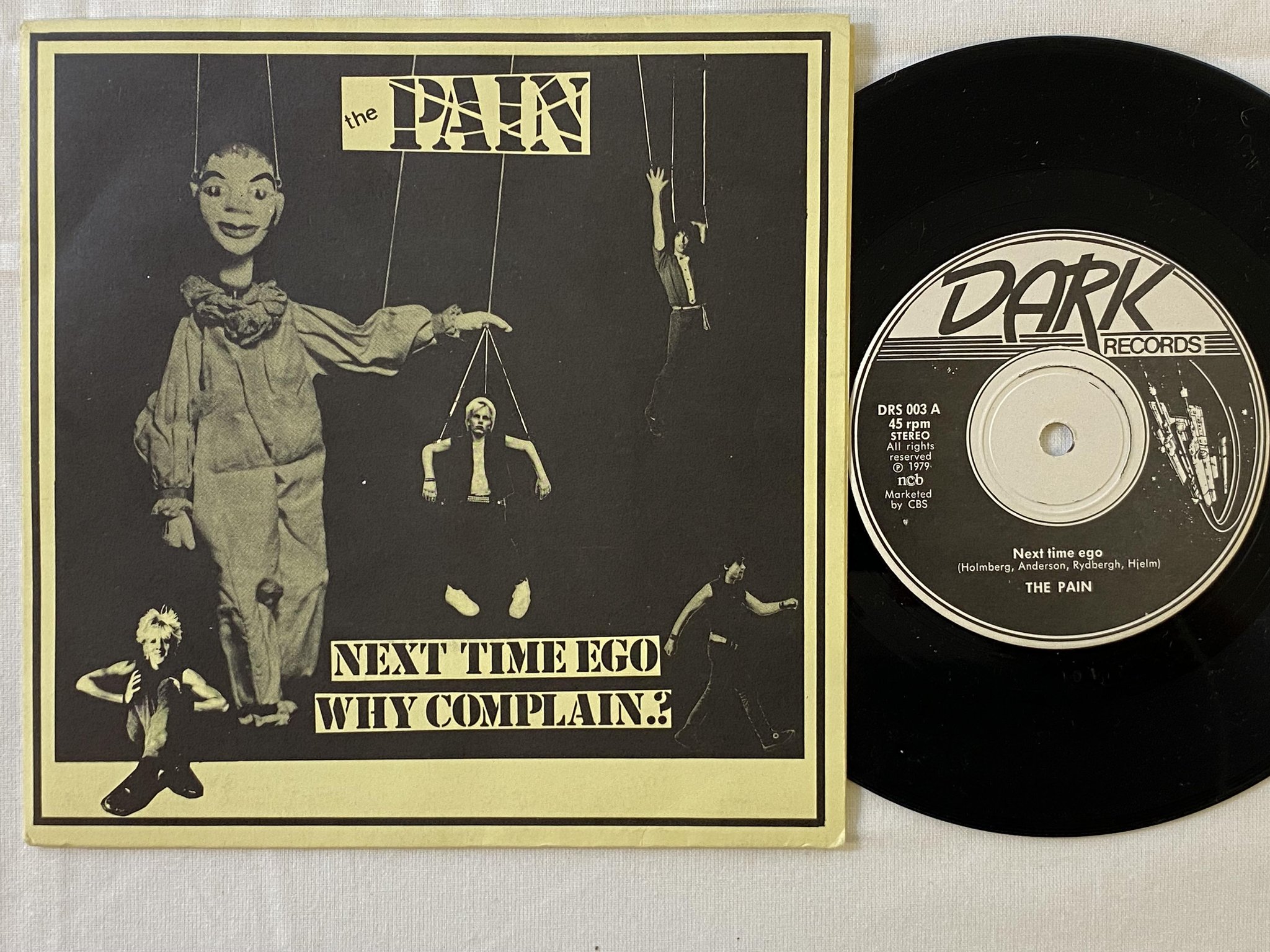 Omslagsbild för skivan THE PAIN Next Time Ego 7"single -79 Swe DARK RECORDS DRS 003