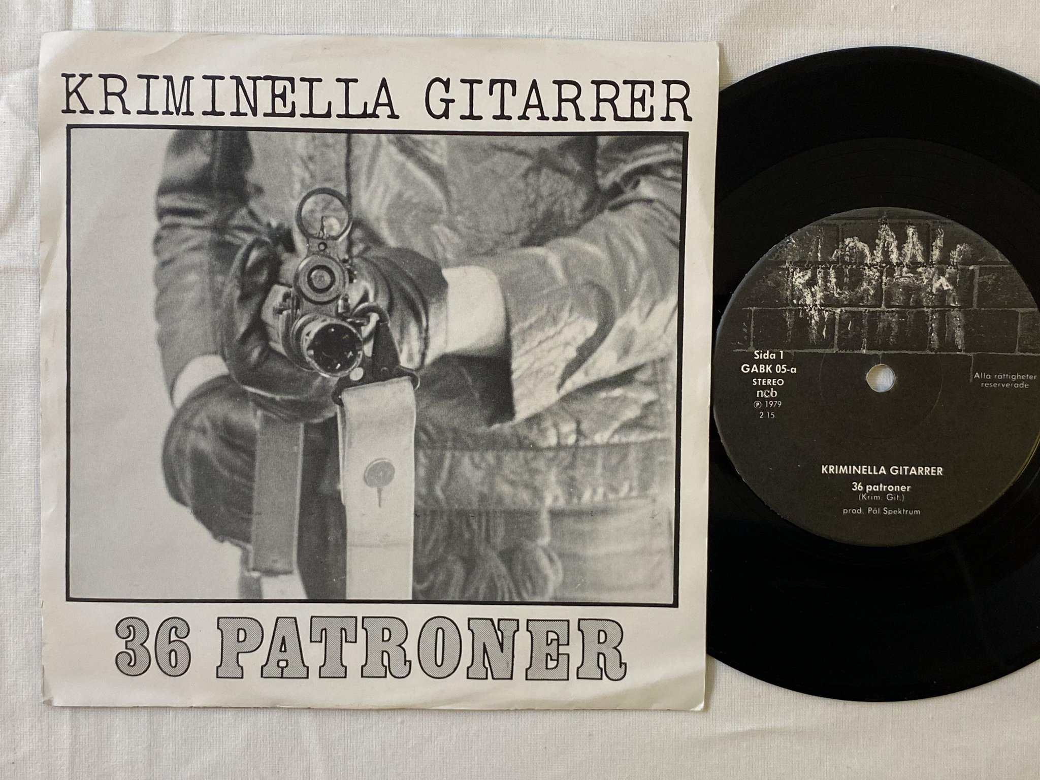 Omslagsbild för skivan KRIMINELLA GITARRER 36 Patroner 7"single -79 KLOAAK GABK 05 ** rare punk **