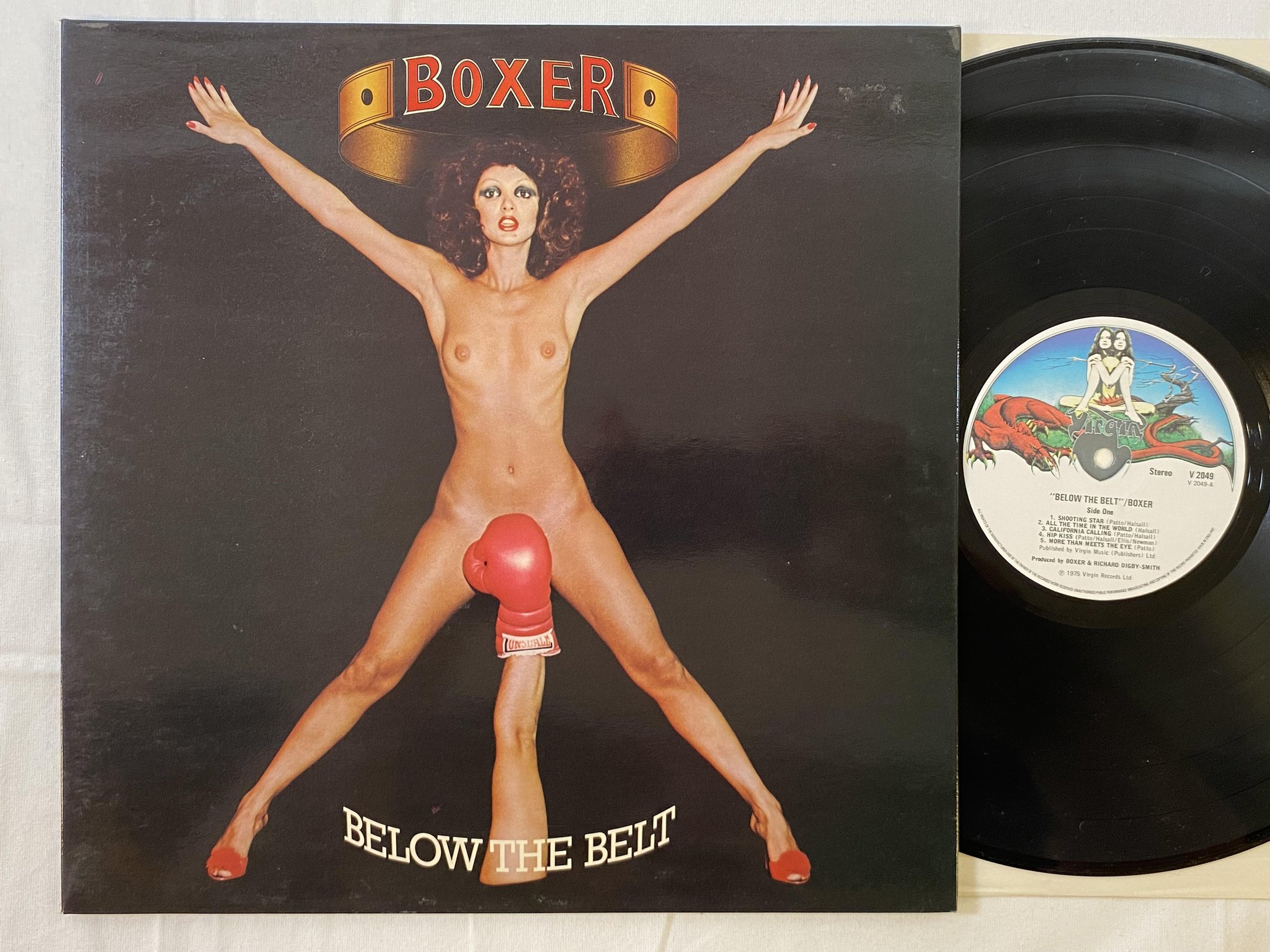Omslagsbild för skivan BOXER below the belt LP -75 UK VIRGIN V2049