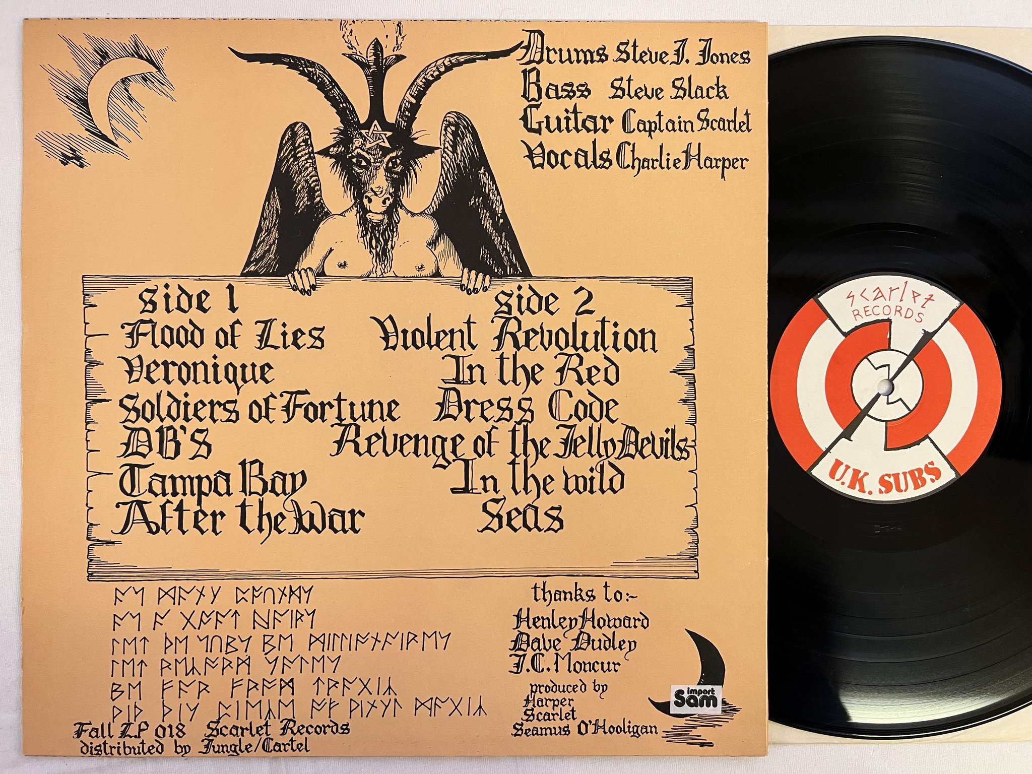 Omslagsbild för skivan U.K. SUBS Flood Of Lies LP -83 UK FALLOUT FALL LP 018