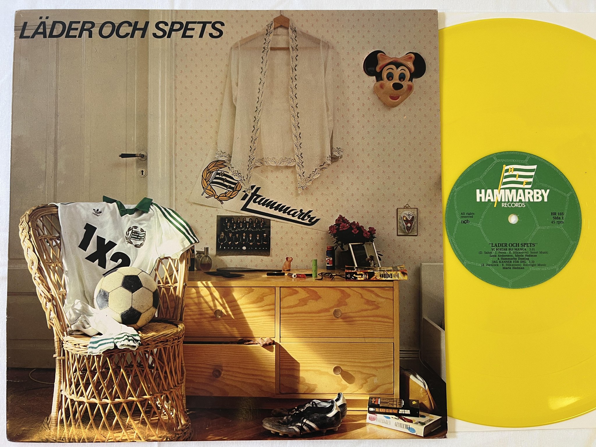 Omslagsbild för skivan HAMMARBY ALLSVENSKA DAMLAG läder och spets LP -81 HR 103 GUL VINYL