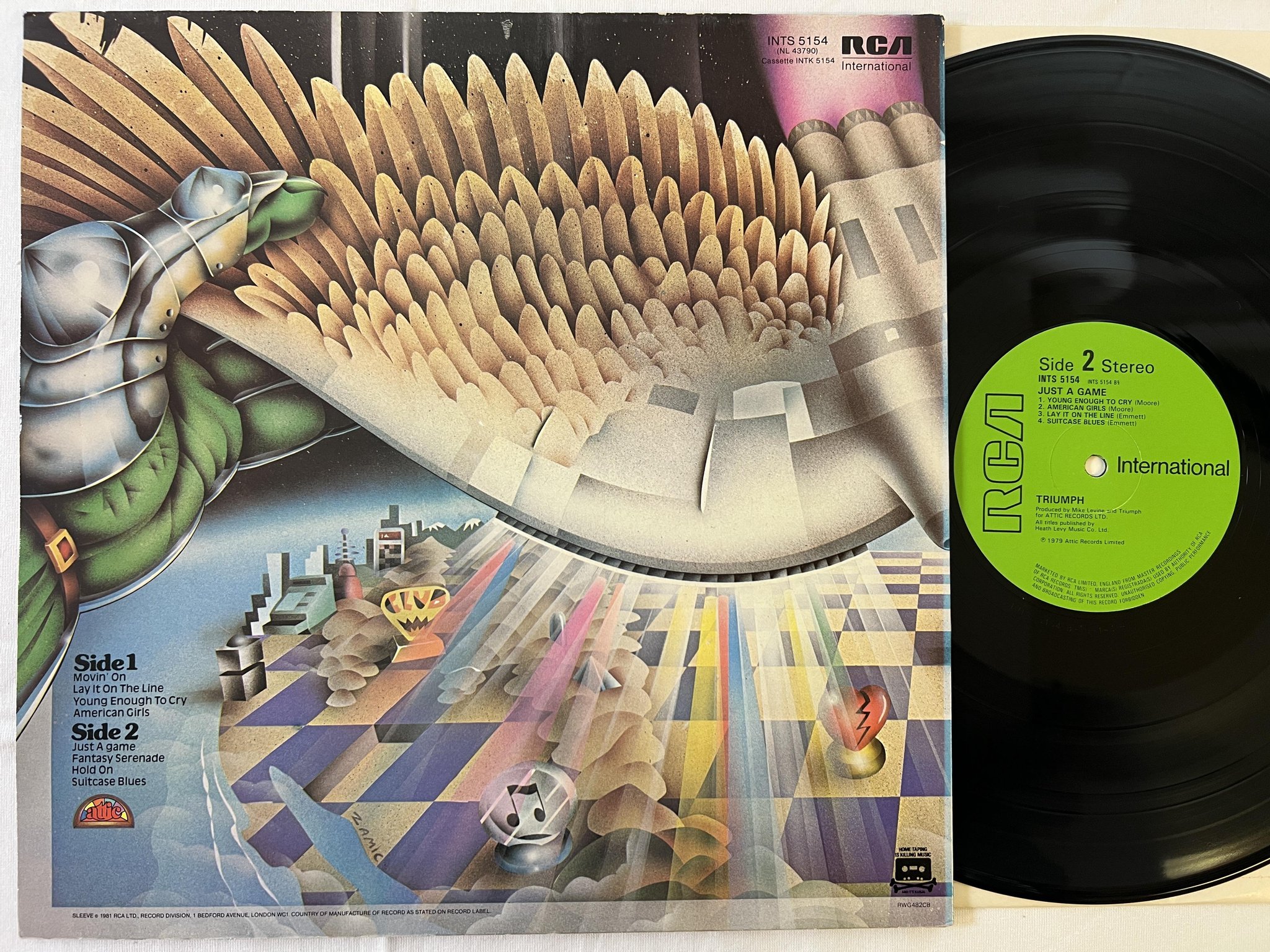 Omslagsbild för skivan TRIUMPH just a game LP -81 UK RCA INTERNATIONAL INTS 5154