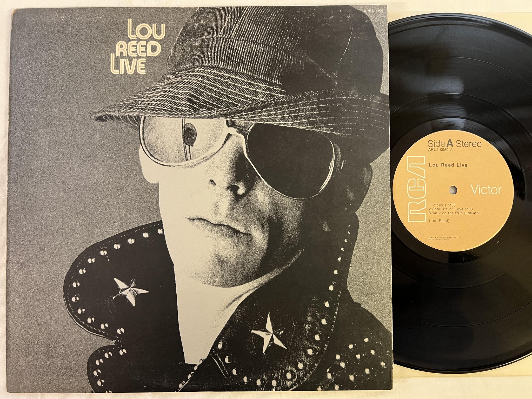 Omslagsbild för skivan LOU REED live LP -75 US RCA APL1-0959 