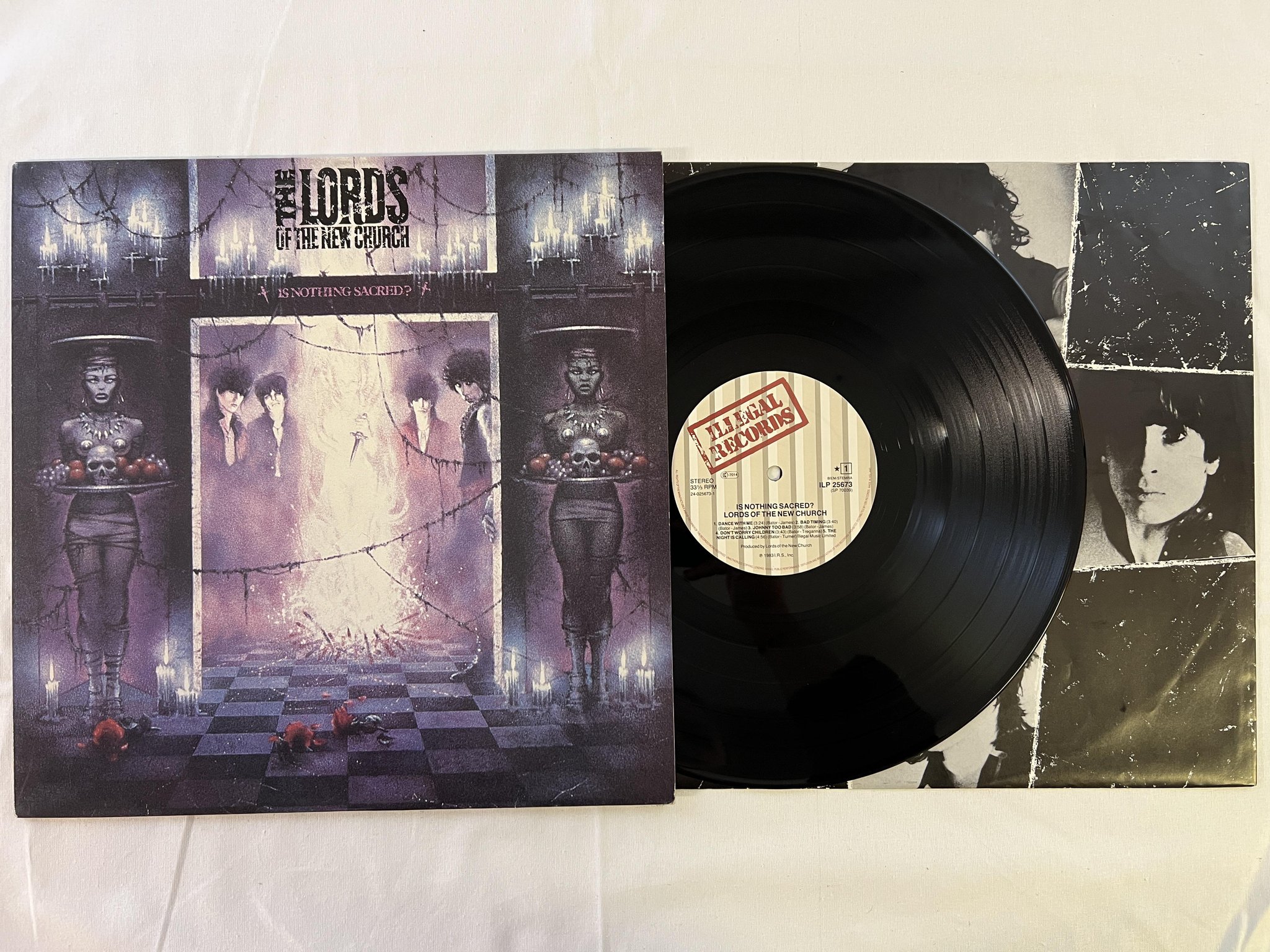 Omslagsbild för skivan LORD OF THE NEW CHURCH is nothing sacred LP -83 Hol ILLEGAL ILP 25673