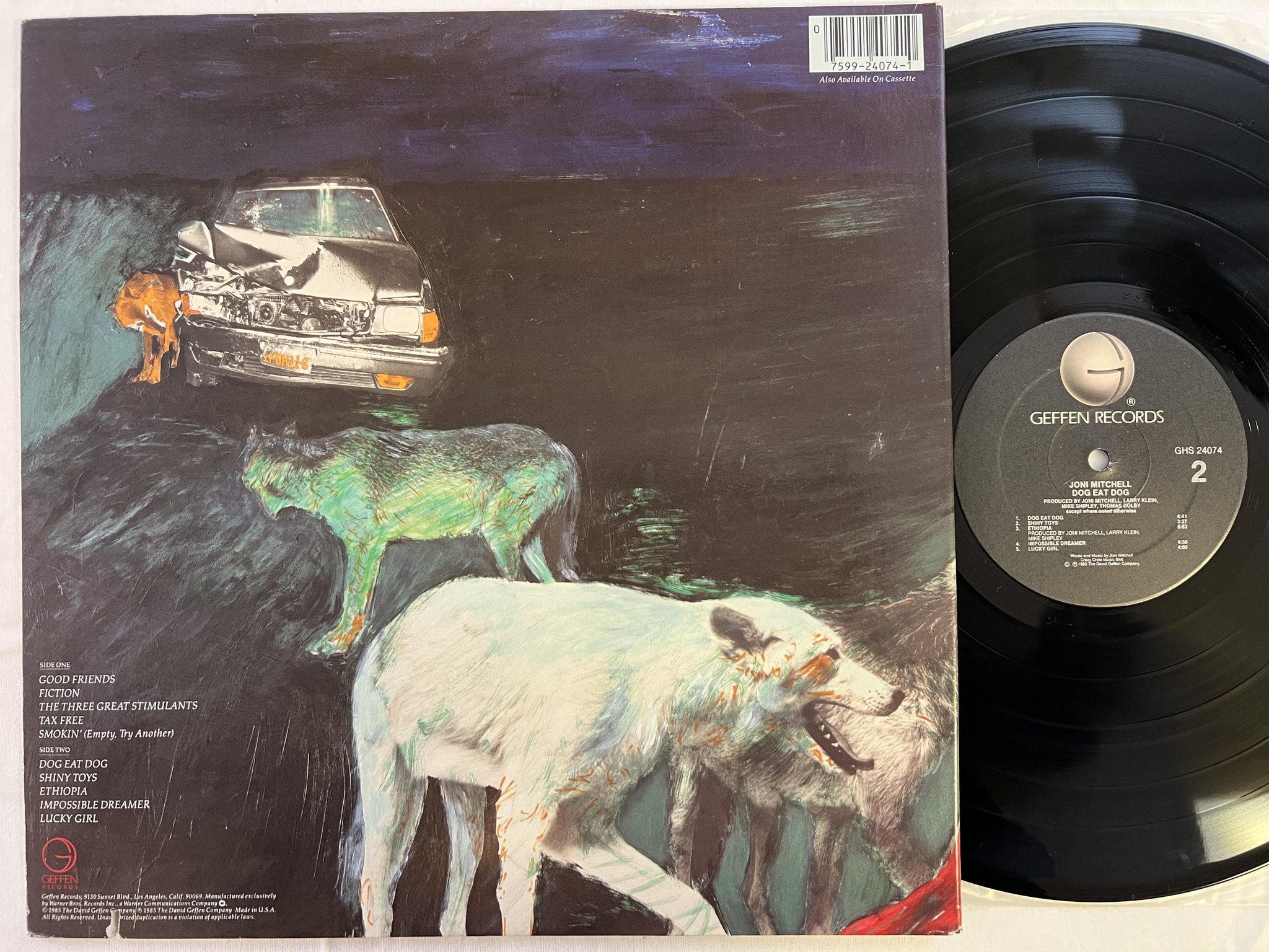Omslagsbild för skivan JONI MITCHELL dog eat dog LP -85 US GEFFEN GHS 24074