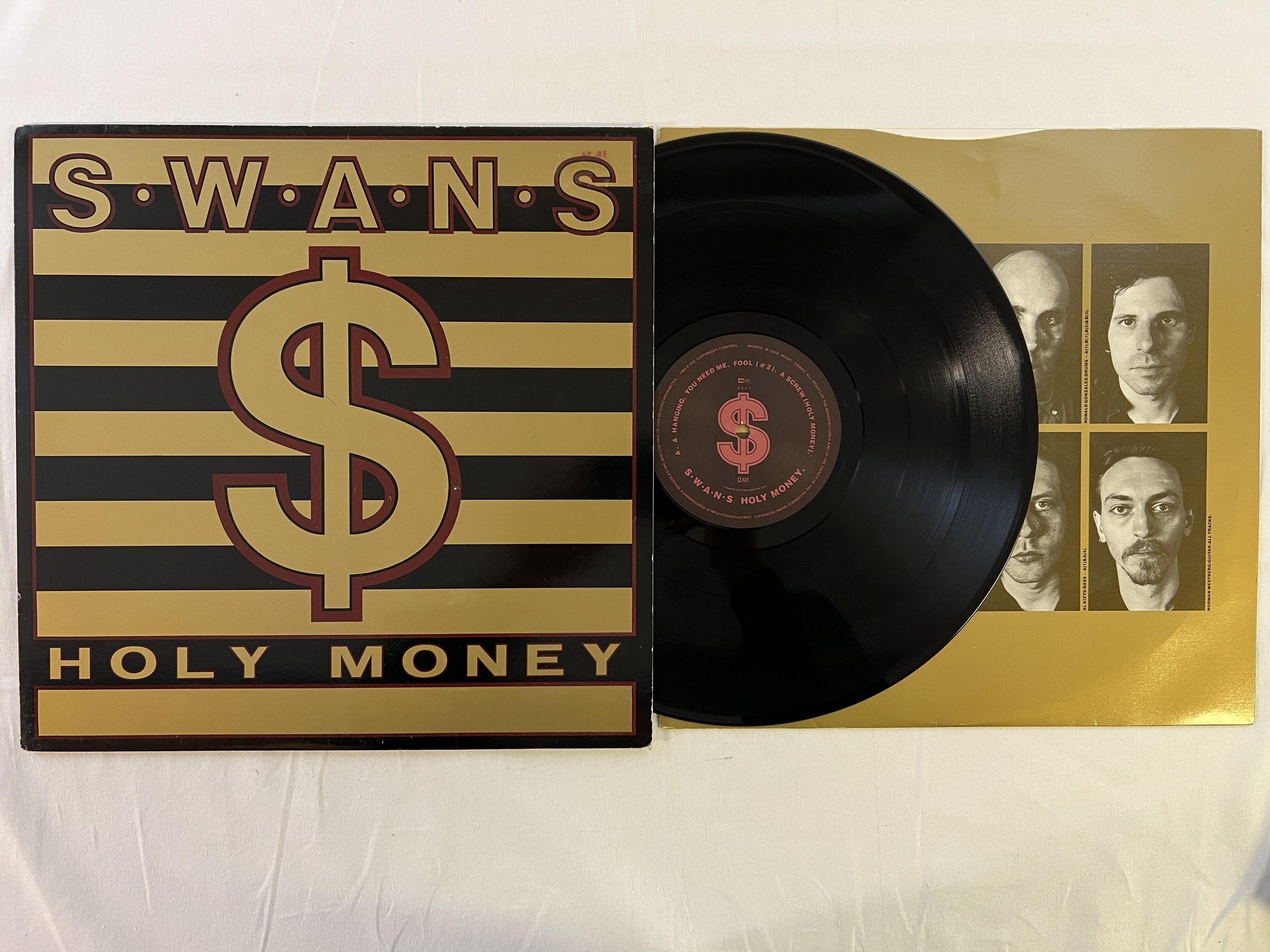 Omslagsbild för skivan SWANS holy money LP -86 UK K.422 KCC 3 electronic / rock 