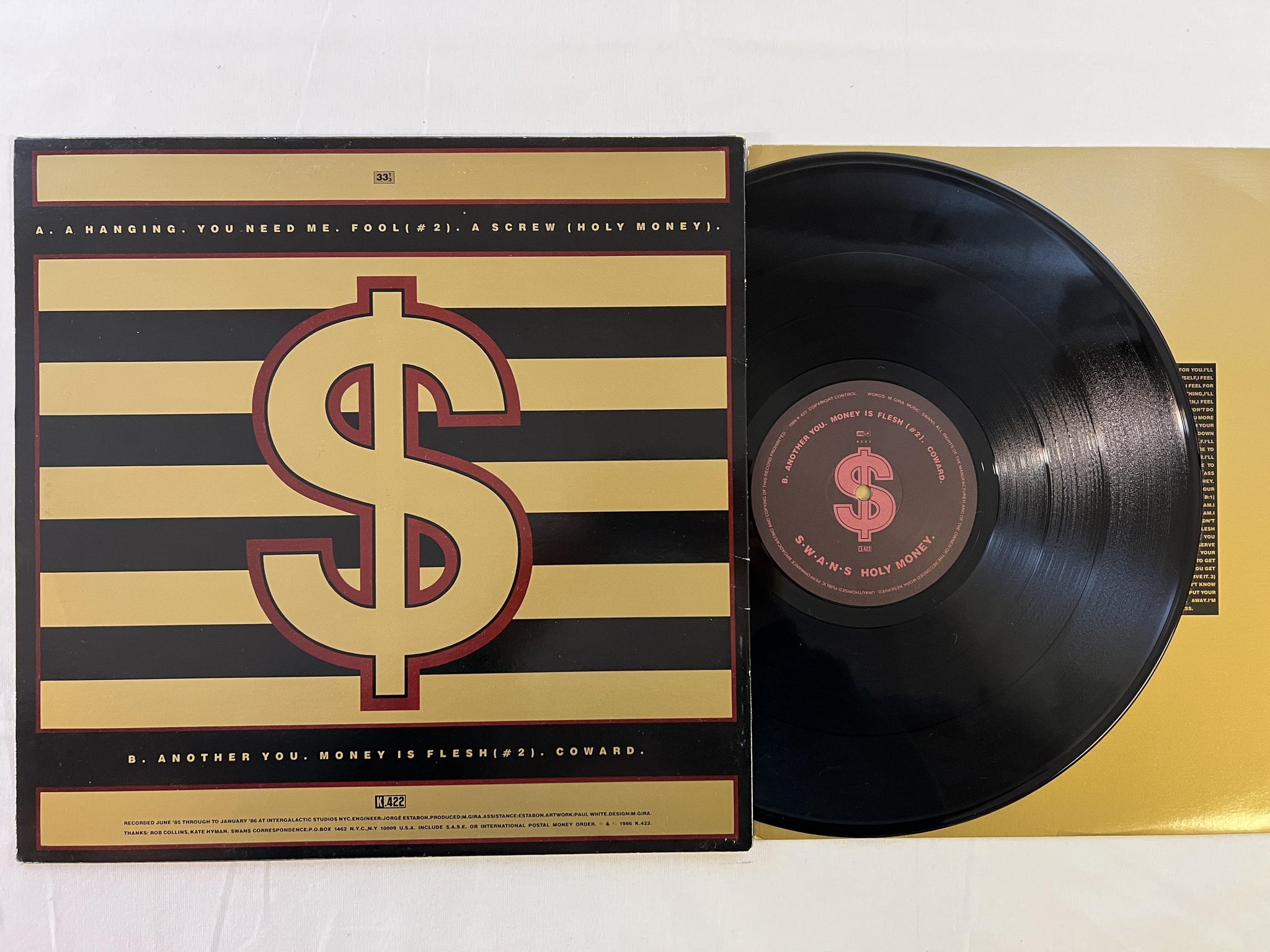 Omslagsbild för skivan SWANS holy money LP -86 UK K.422 KCC 3 electronic / rock 